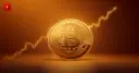 Bitcoin coin with a rising chart
