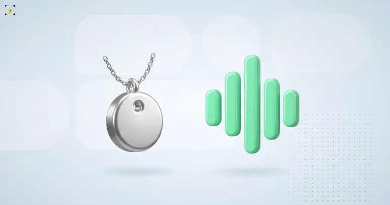 Серебряный кулон на цепочке и зелёный индикатор уровня звука