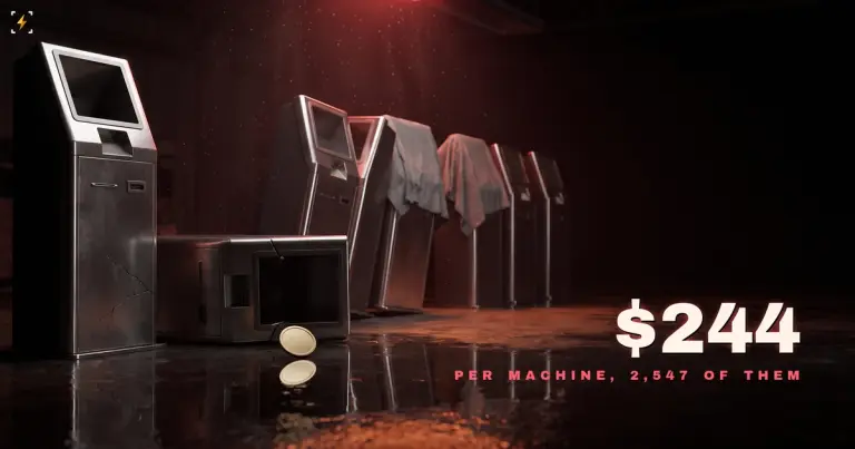 A row of abandoned steel kiosks leaning in a dark warehouse with one fallen and cracked