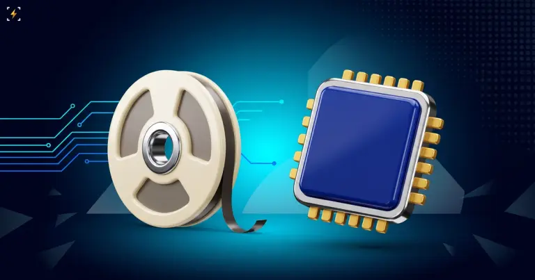 Glossy magnetic tape reel beside a modern processor chip with circuit traces stopping short