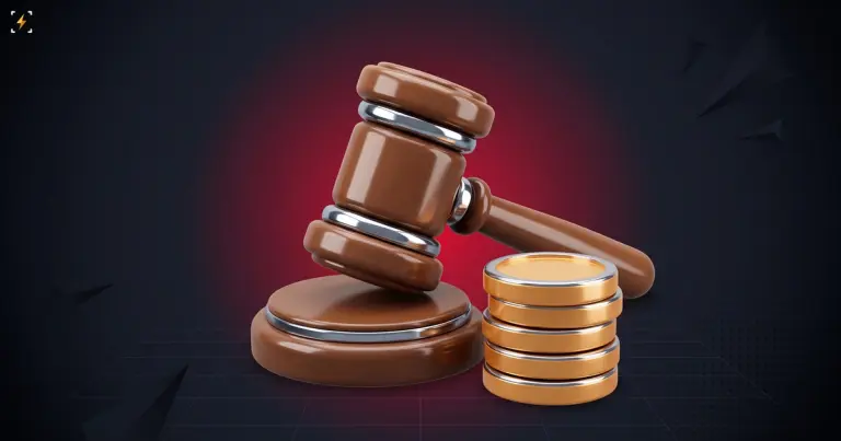 Judge's gavel on its block beside a stack of five blank gold coins