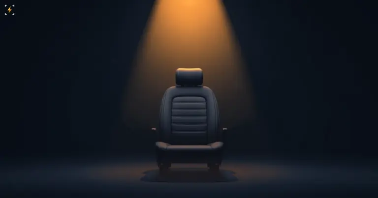 An empty matte car seat under a warm amber light on an indigo ground, illustrating a robotaxi with no driver