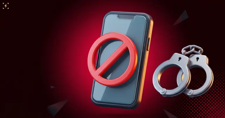A smartphone with a red prohibition ring across its screen beside closed steel handcuffs, illustrating Korea blocking Polymarket and charging its users