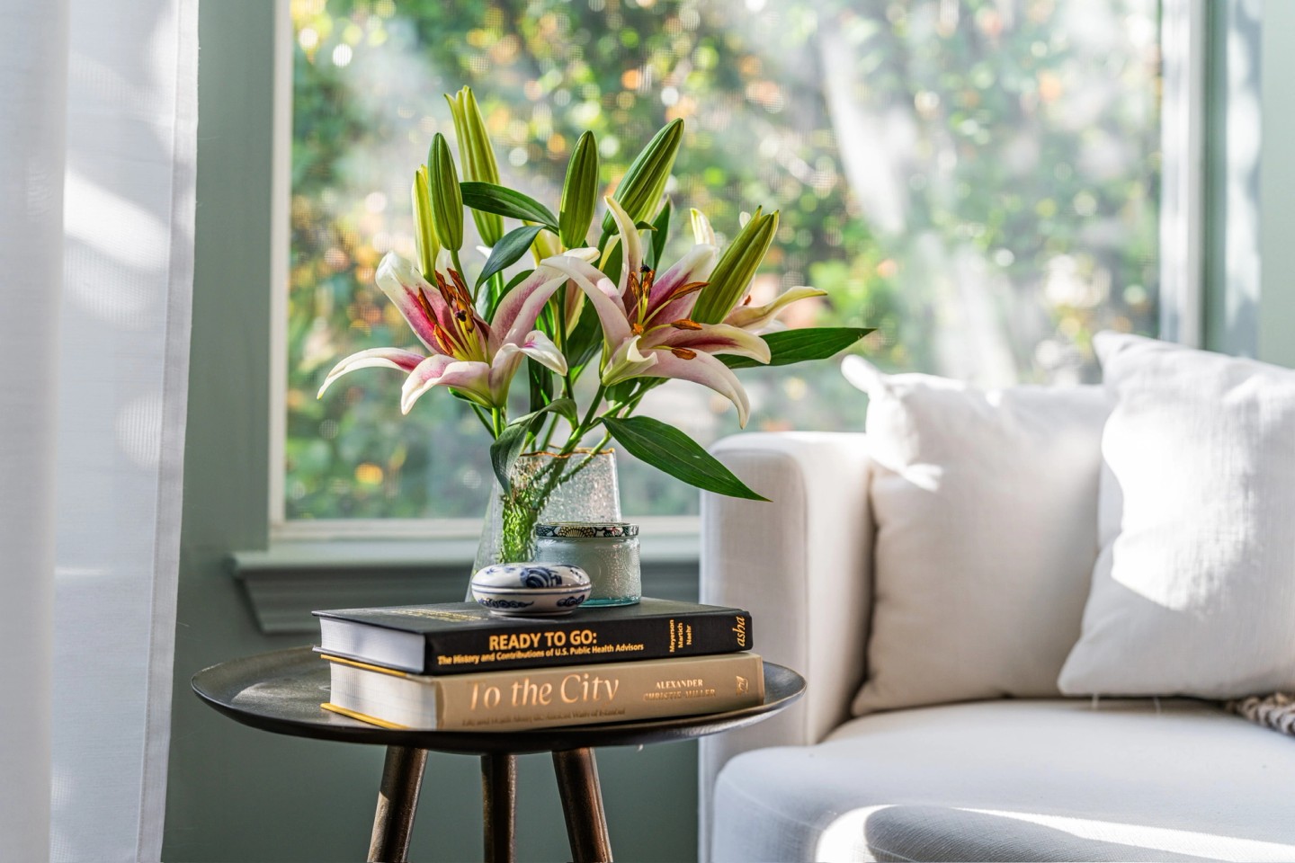 MOODY landscape, flowers on coffee table close-up