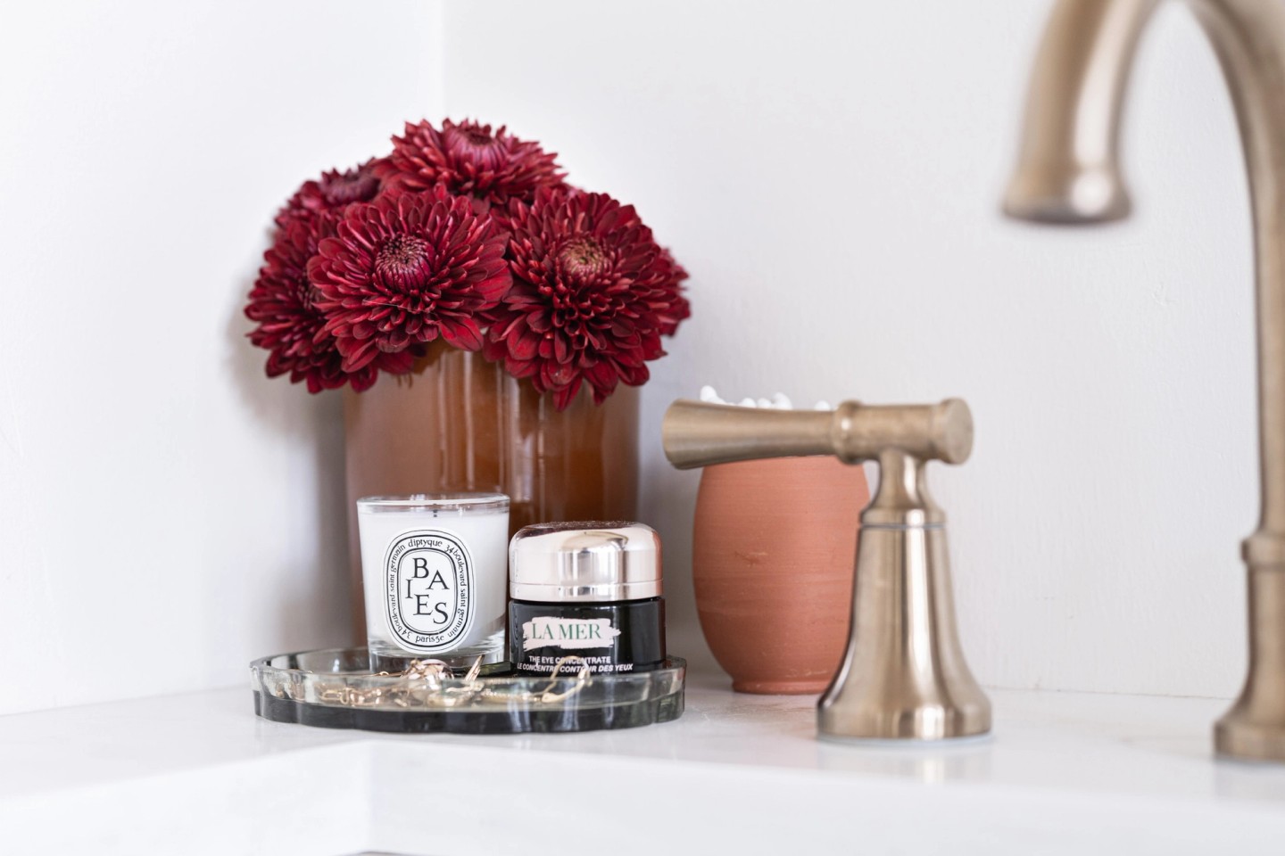 GARDEN landscape, candles and faucet close-up