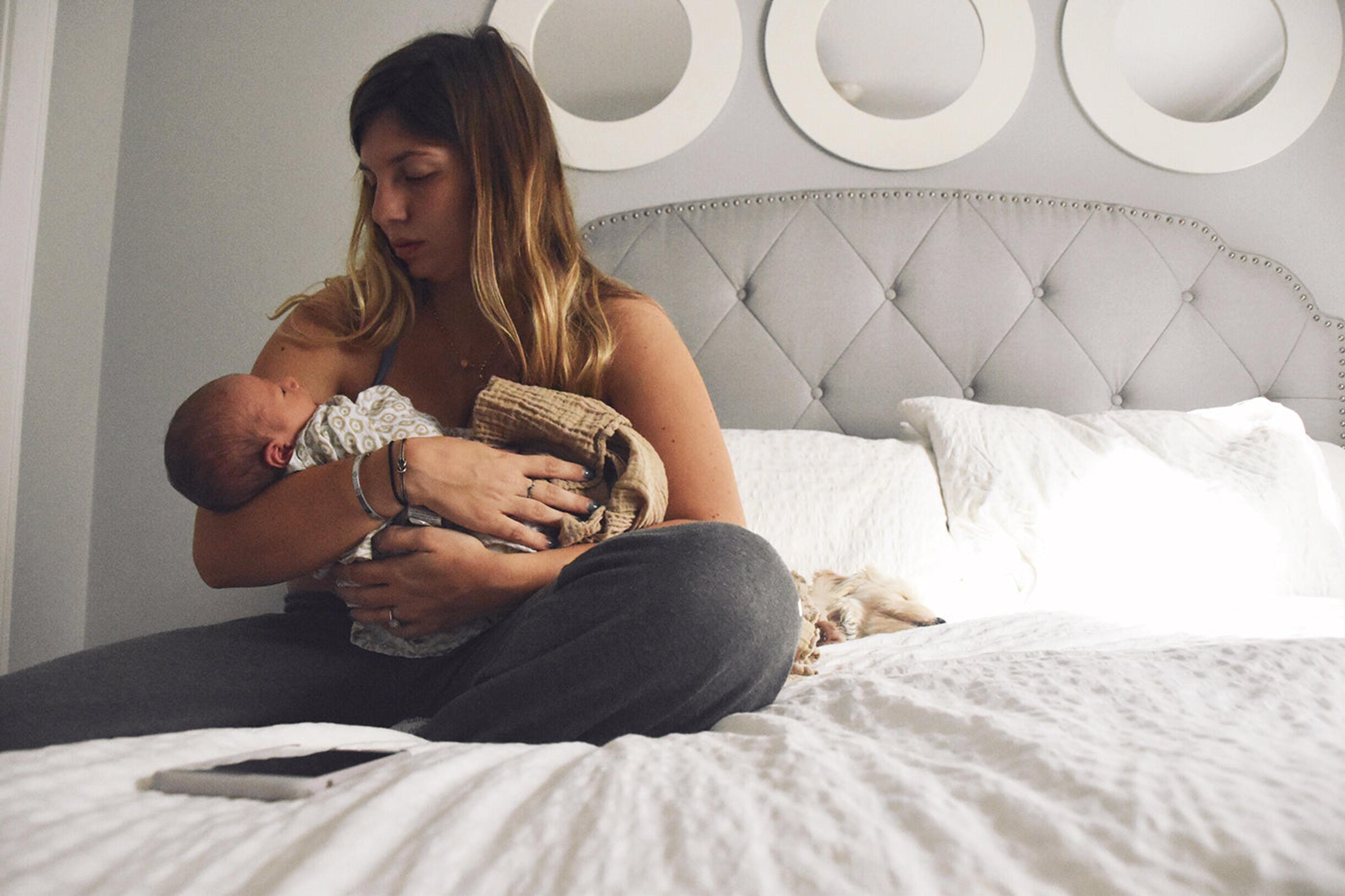 mom-about-to-breastfeed-baby