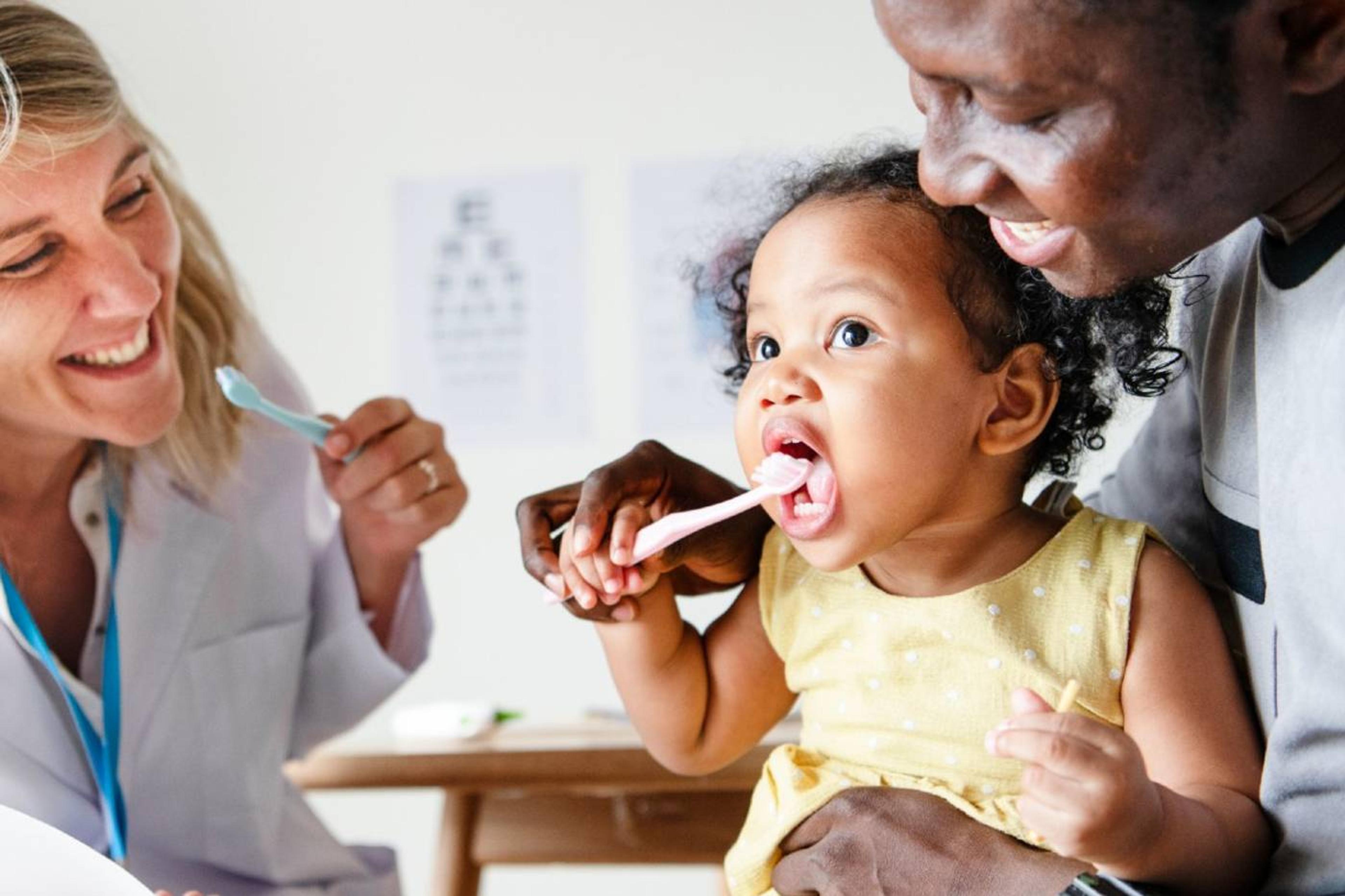 Baby at first dental appointment 