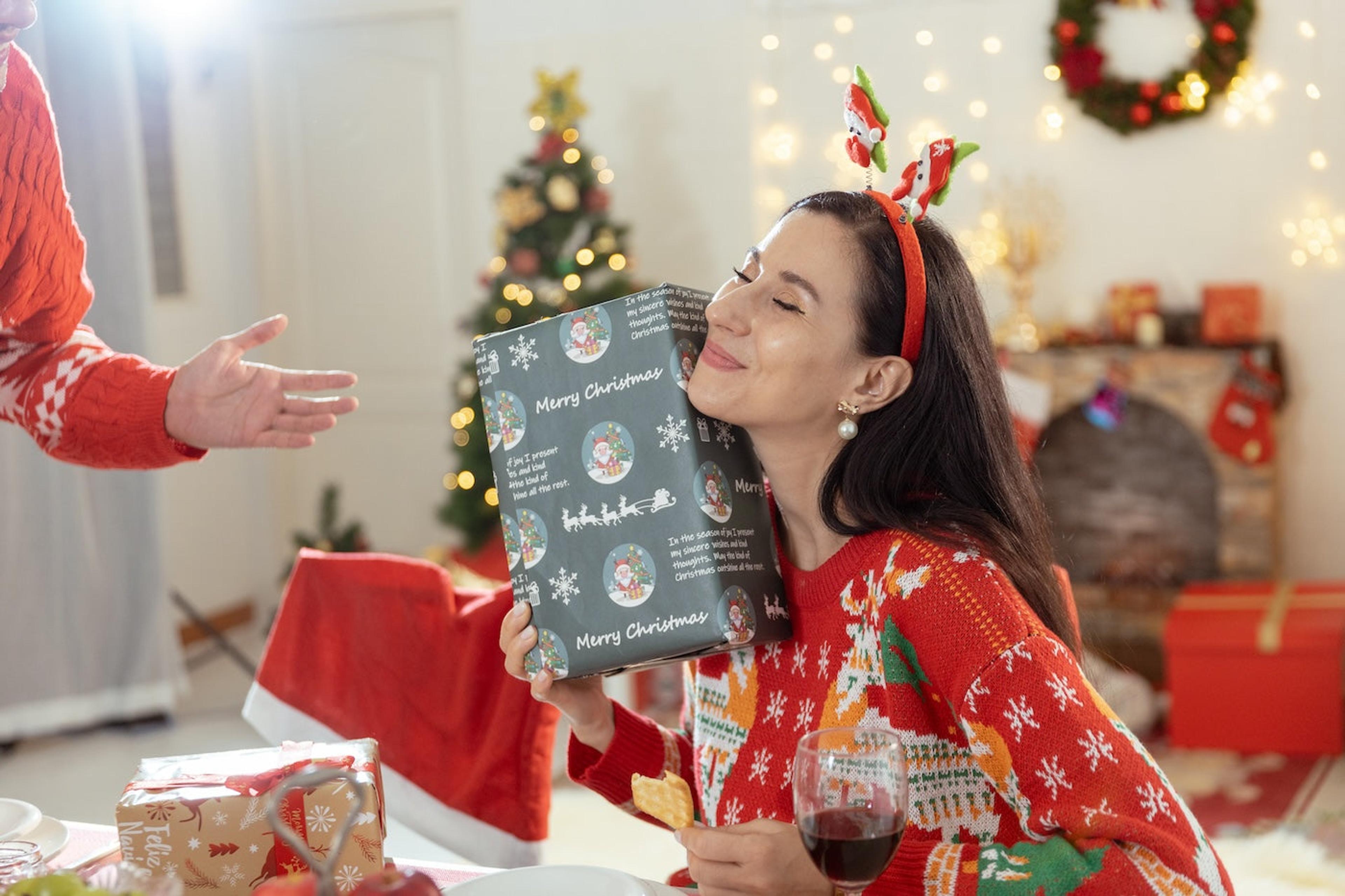 Mom hugging a holiday gift
