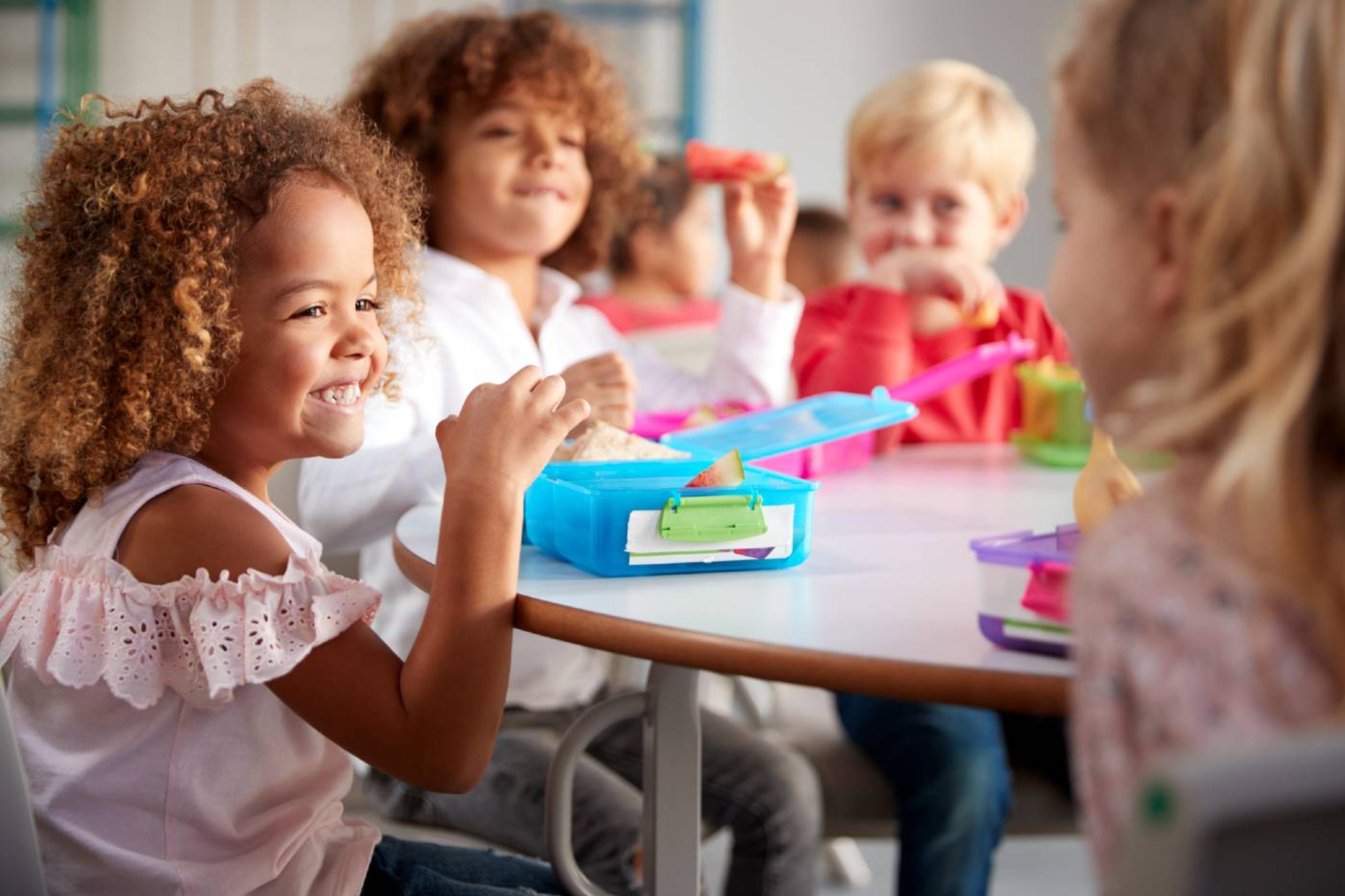 Children eating nut-free snacks at daycare
