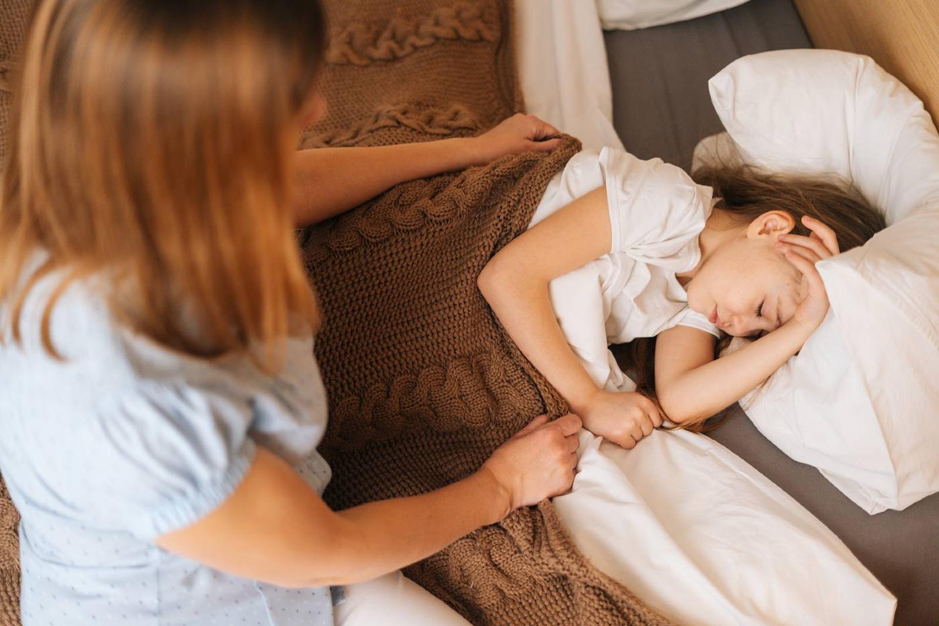 mom looking at child who had night seizures