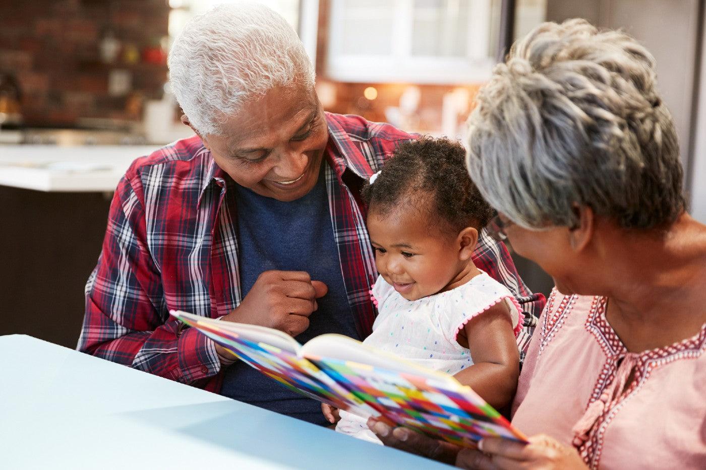 Family reading number book to toddler