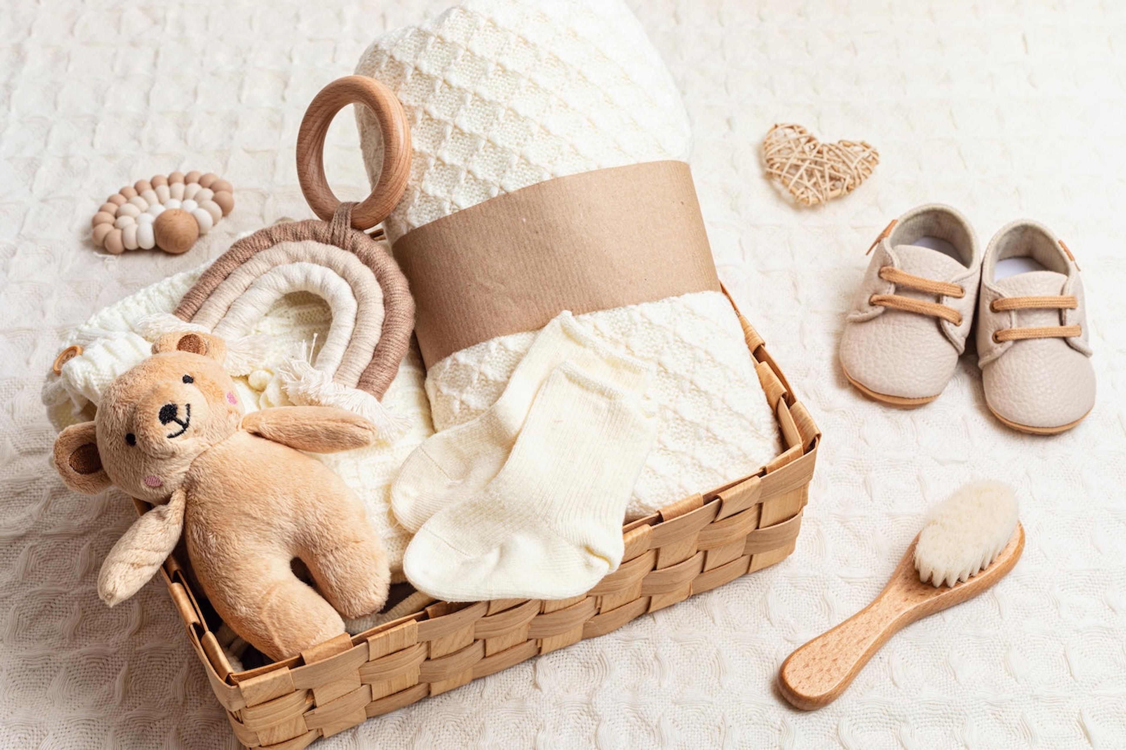 Neutral colored baby shower gift basket