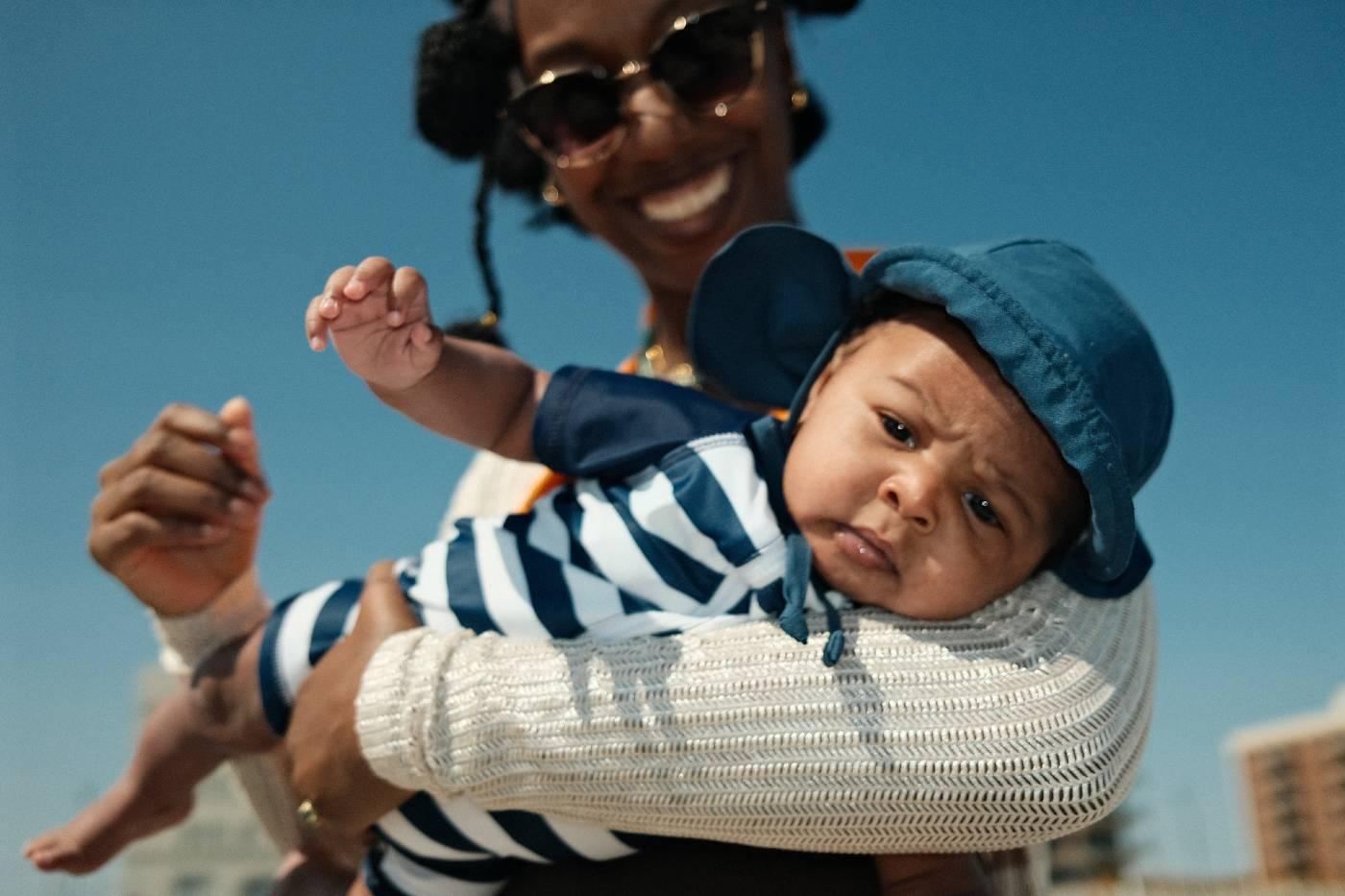 Dominique Drakeford holds son, Sage