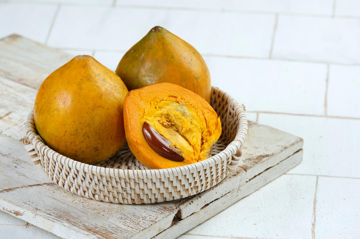 Bowl of lucuma fruit