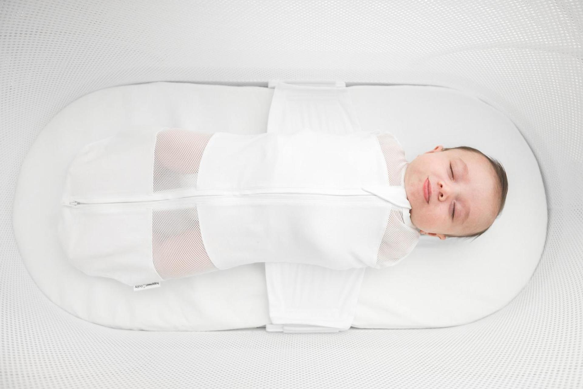 a baby sleeps safely in SNOO Smart Sleeper