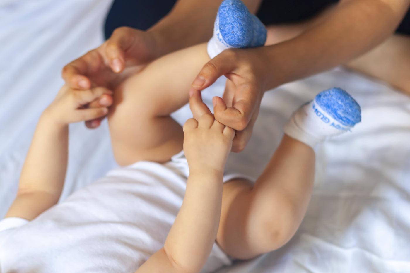 mom-and-new-baby-holding-hands