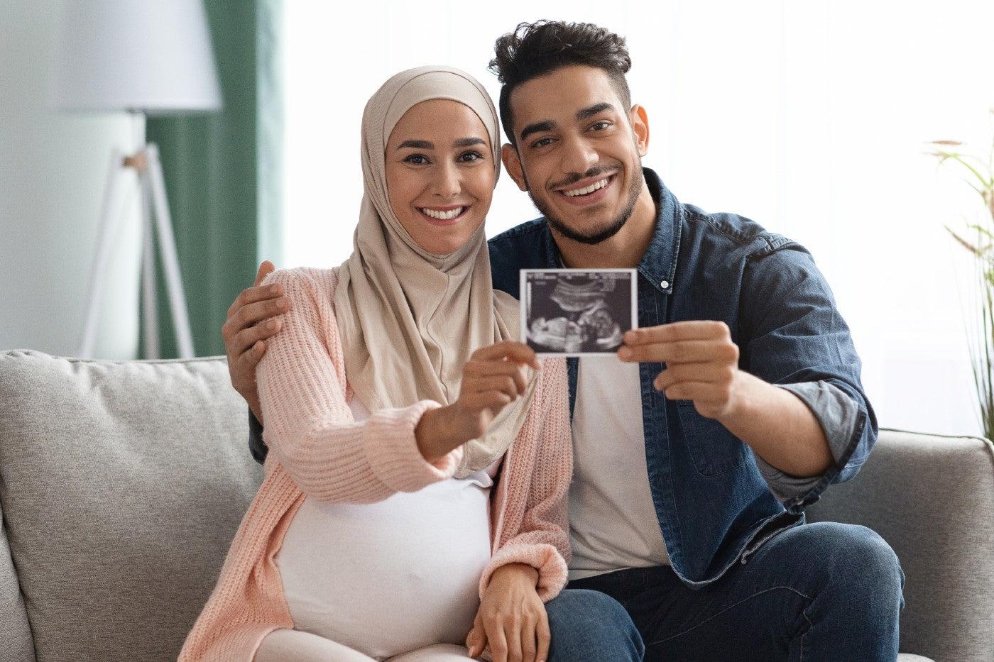 Couple shares an ultrasound photo