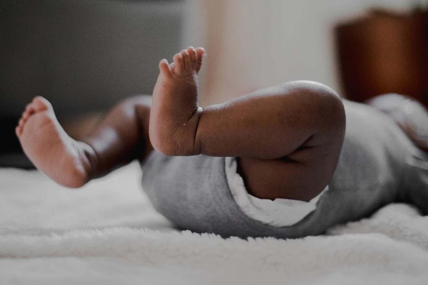 A baby's diapered bottom