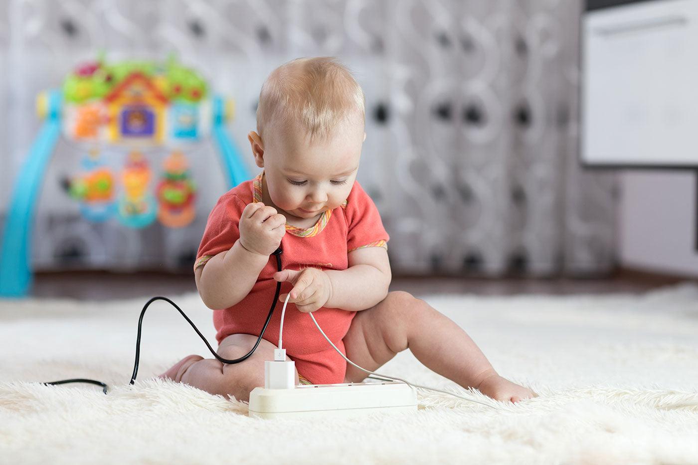 baby proofing tips for baby playing with unsafe cords and power supply