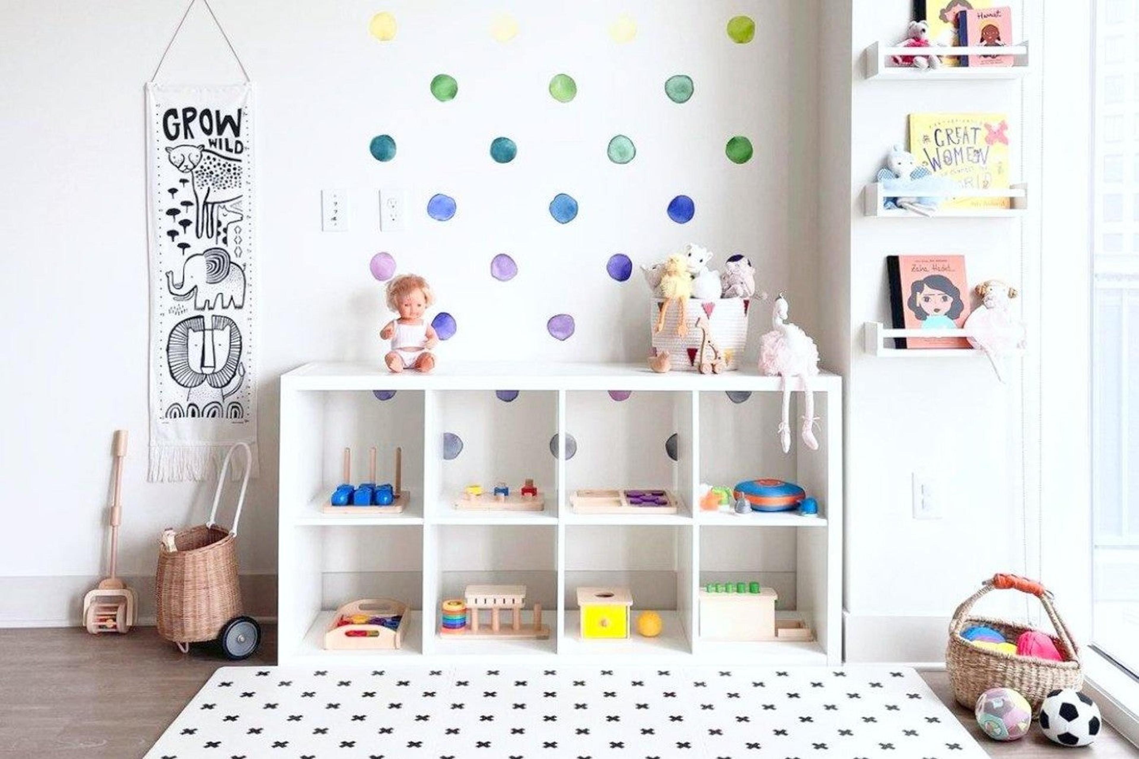 Child's nursery with dot decals on the wall