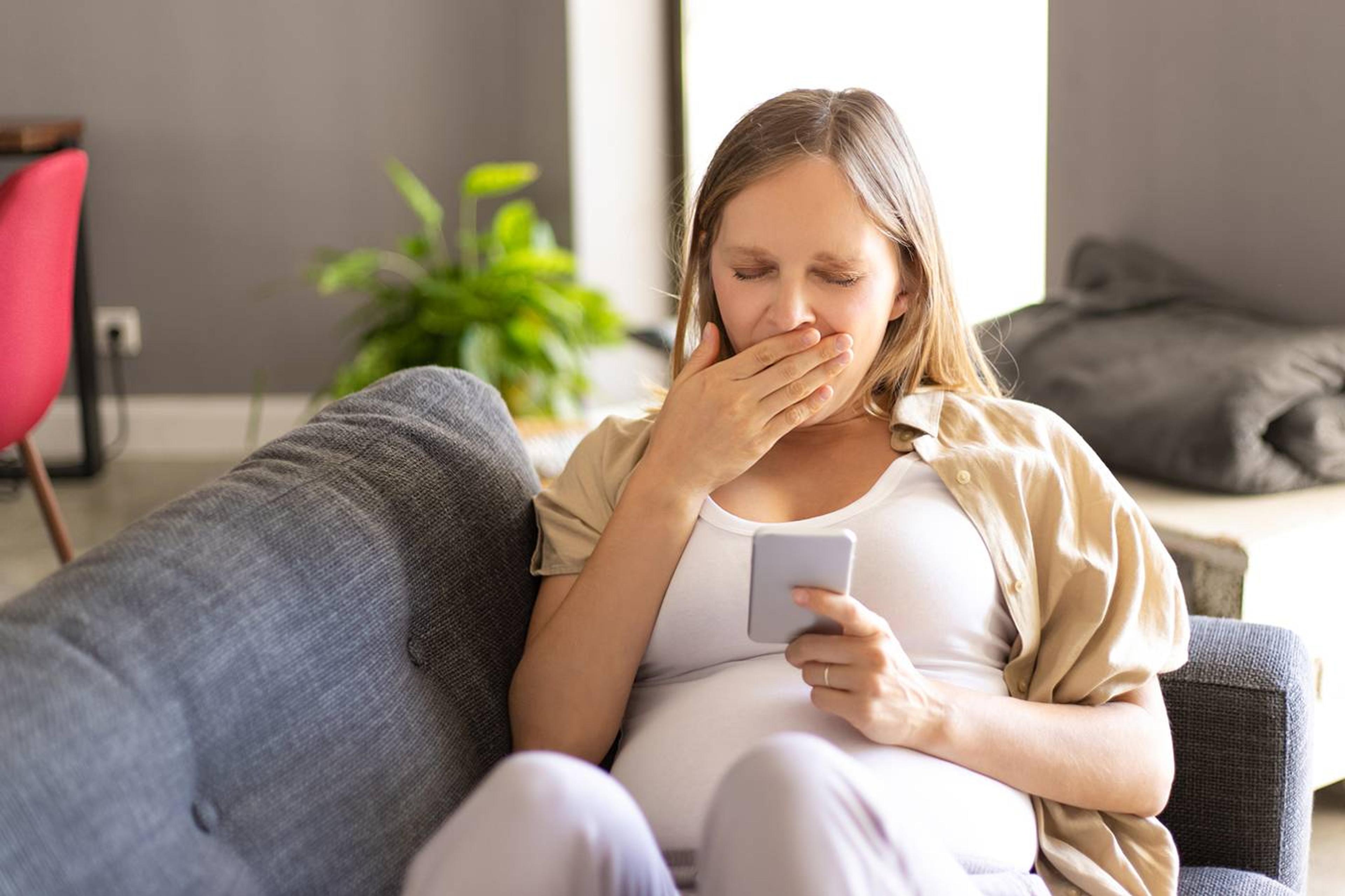 Tired pregnant person with low iron