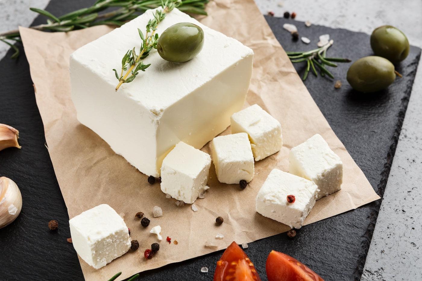 Board of feta cheese with olives