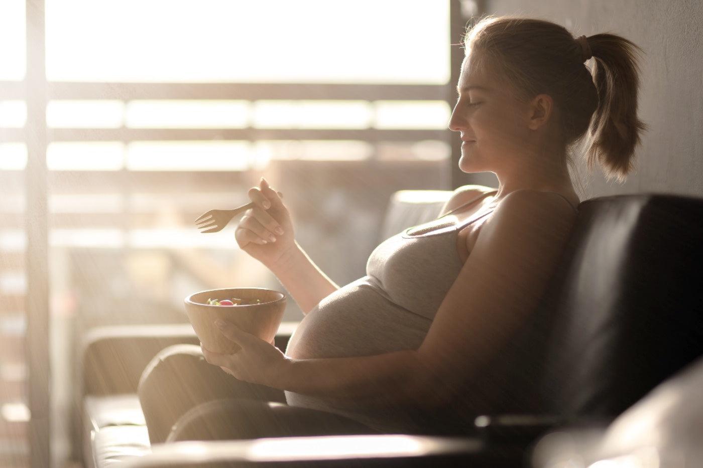Common pregnancy nutrition myths: Pregnant woman eating