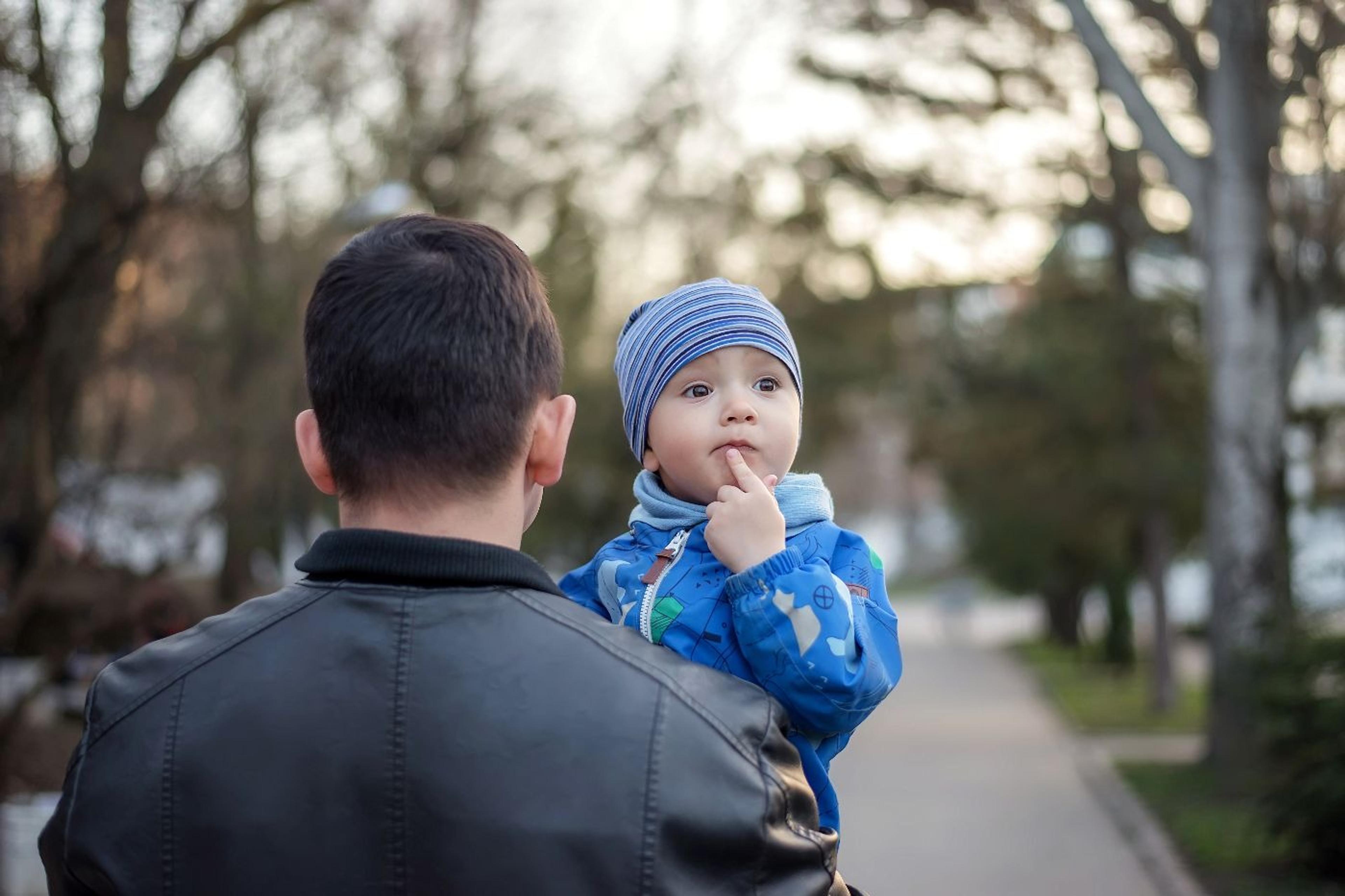 father-and-son-taking-a-walk-outside