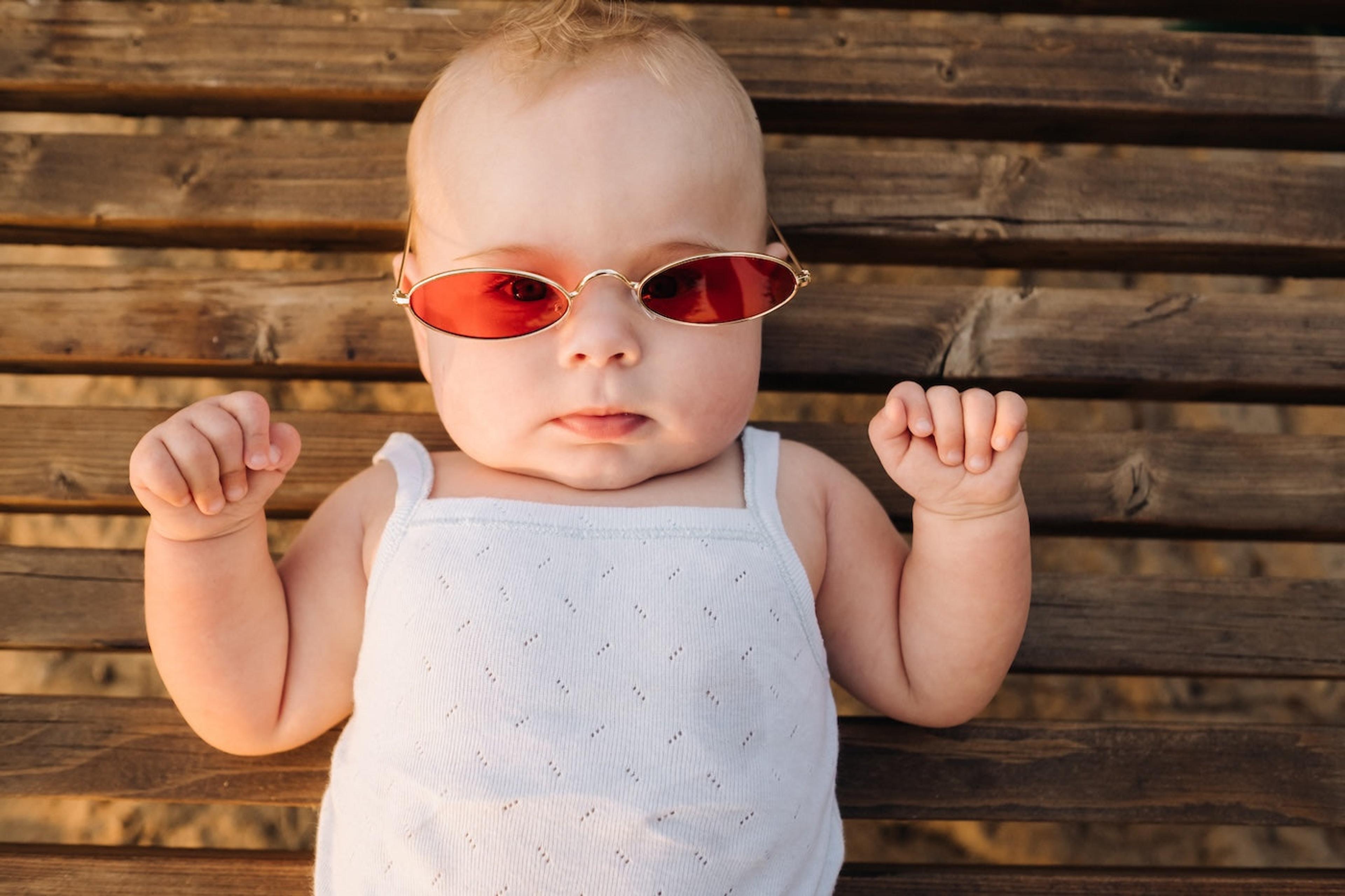 Baby wearing '70s sunglasses