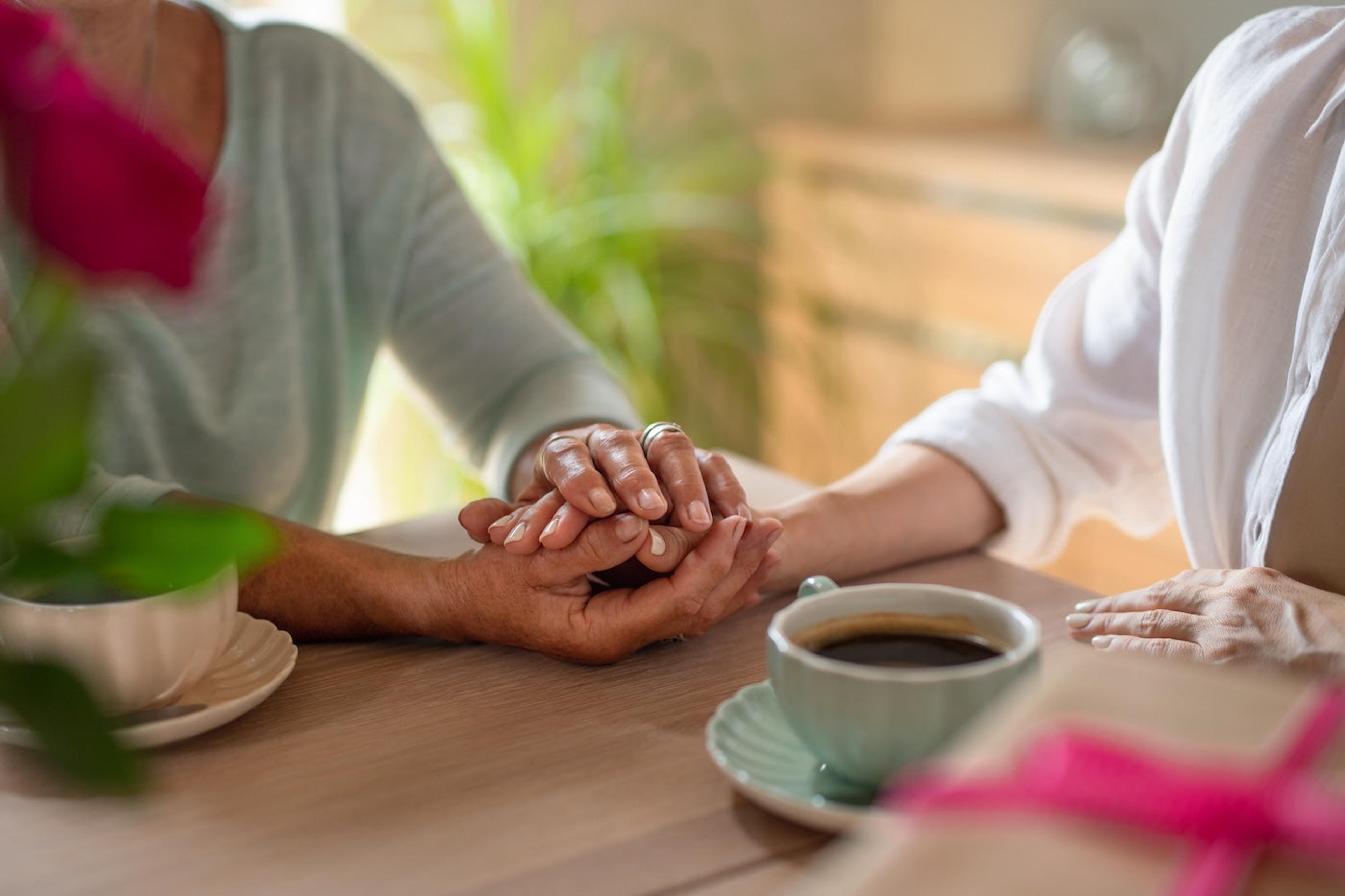 A friend comforting someone coping with miscarriage