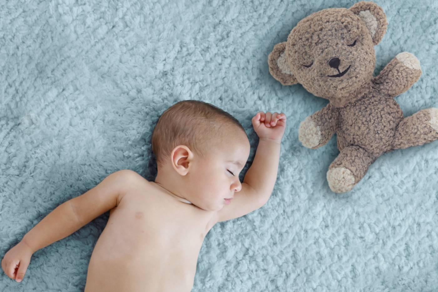 Toddler sleeping with SNOObear