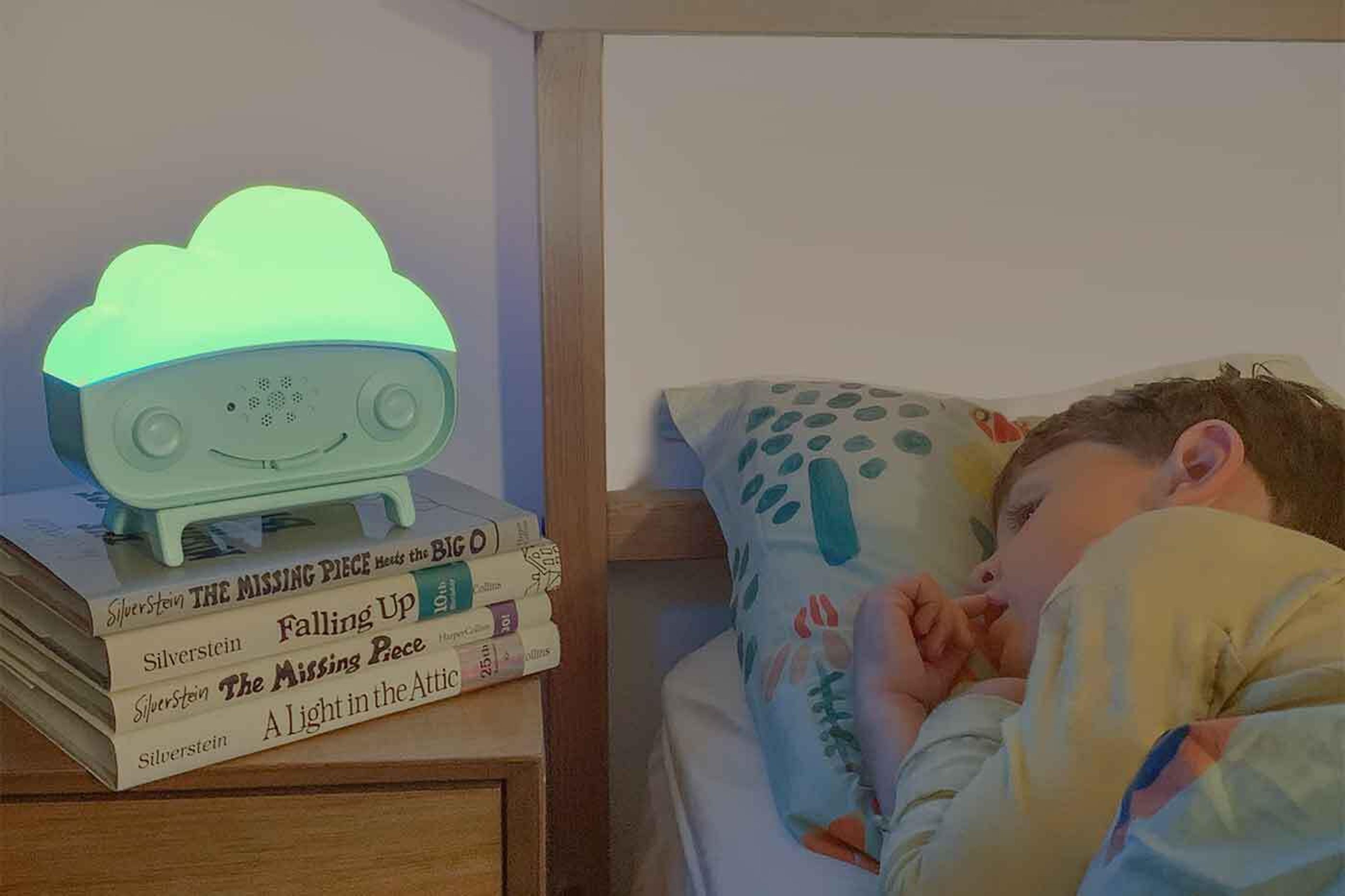 Child sleeping next to SNOObie nightlight