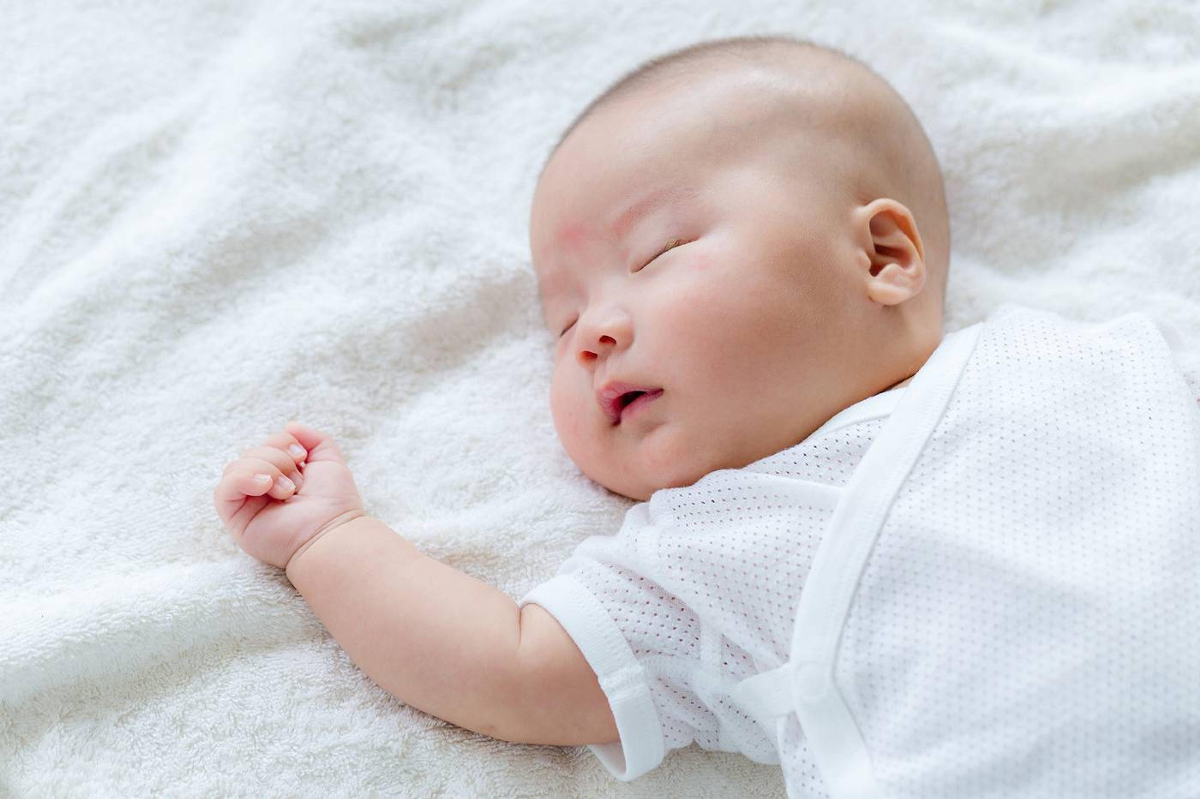 Baby safely sleeping on their back