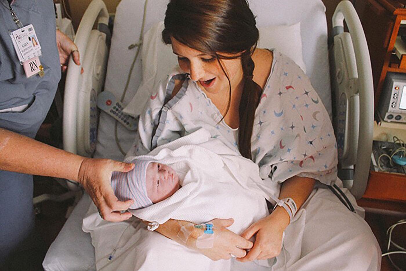 mom-holding-newborn-baby