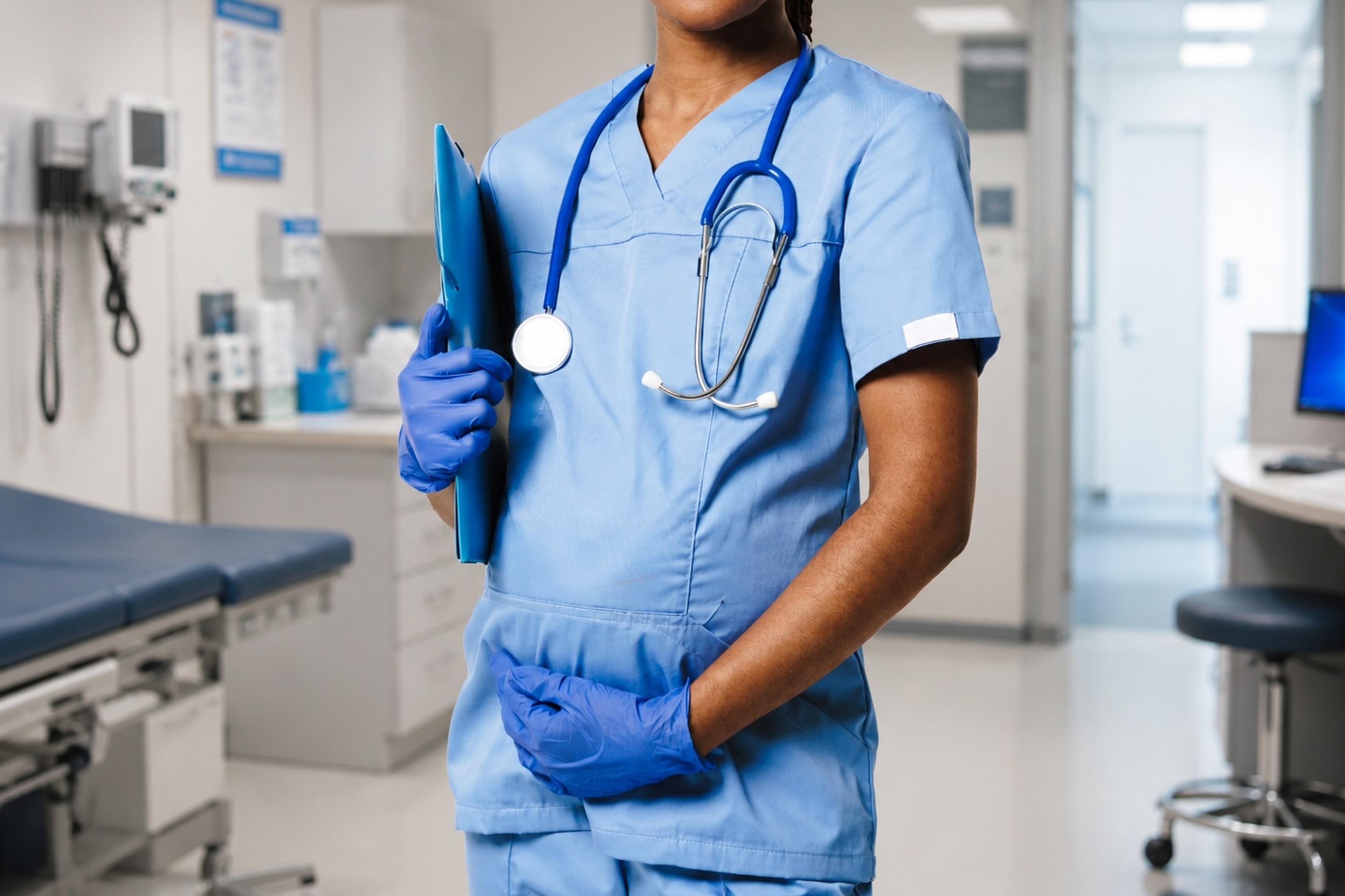 A pregnant physician at work