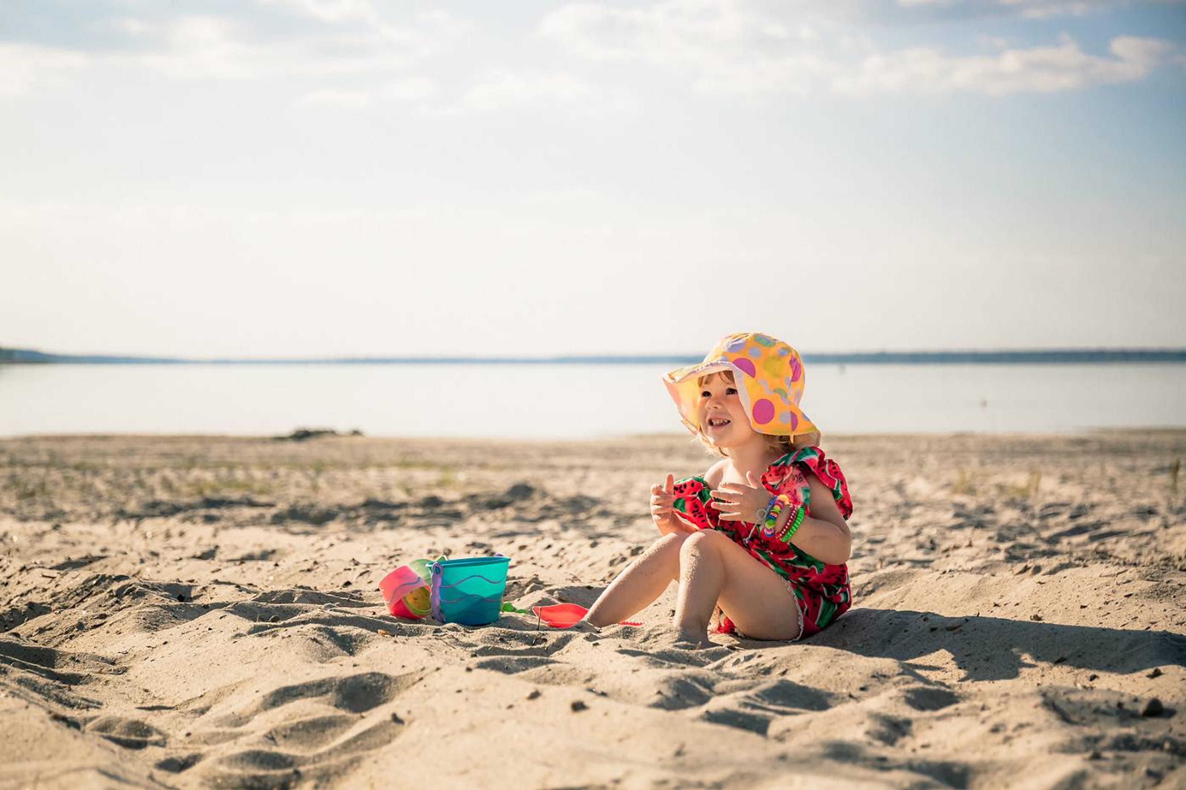 Toddler girl at beach