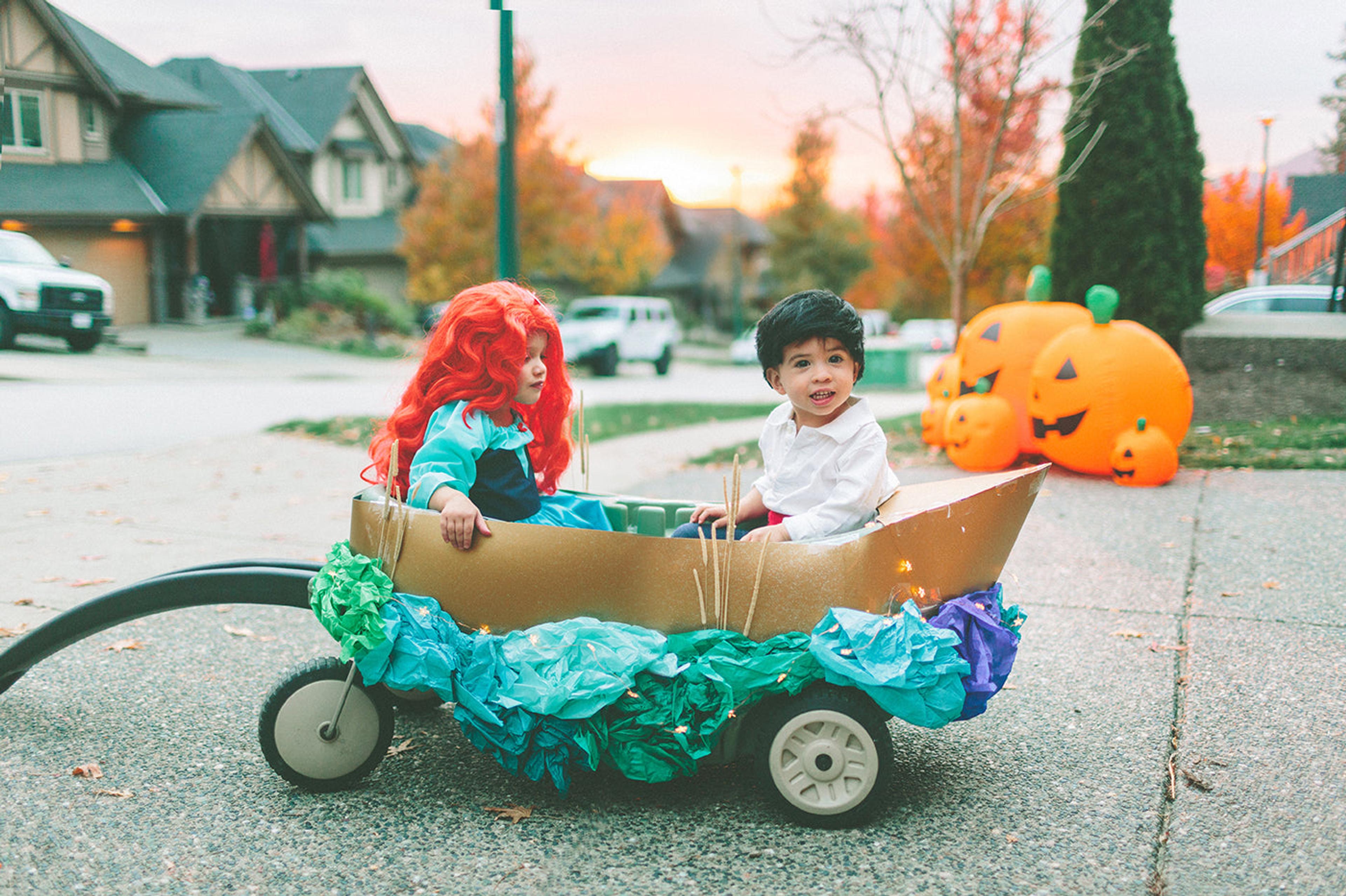Trick or treat during COVID: Two cute kids in costumes