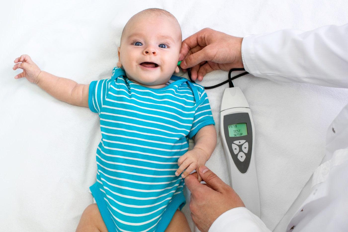 Infant getting their hearing tested