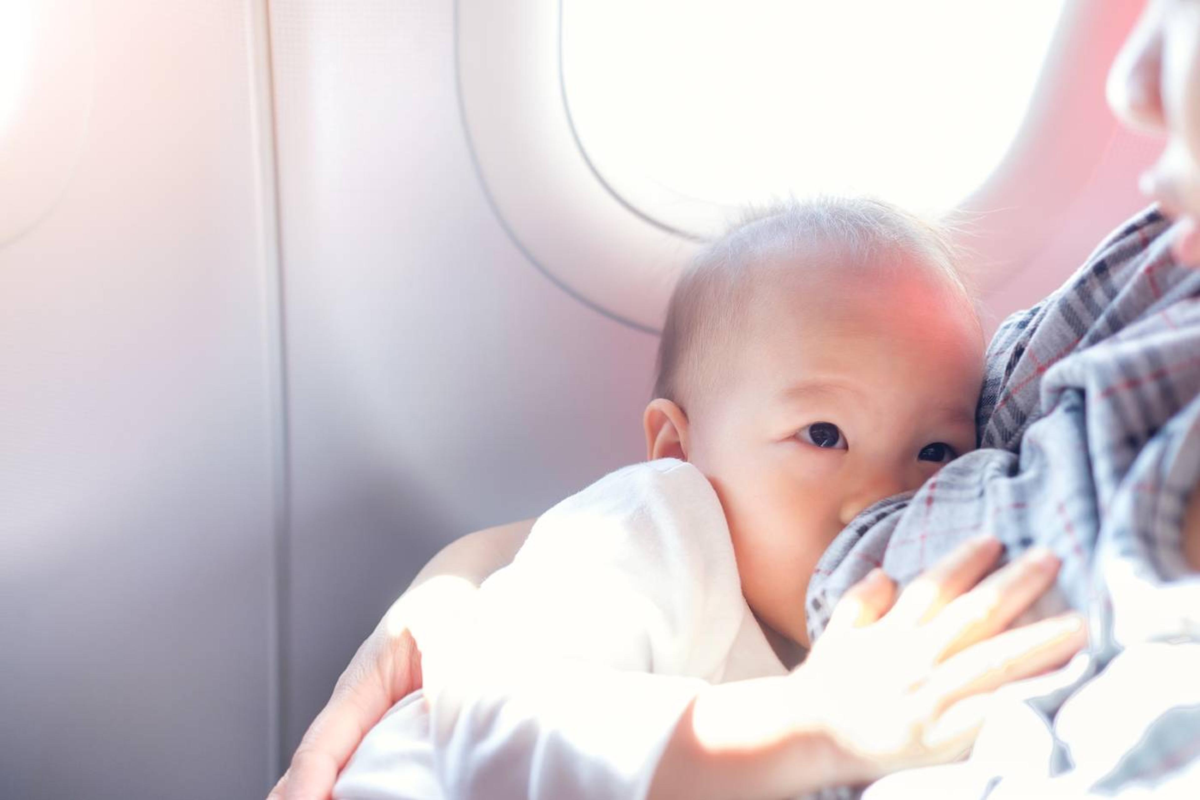 breastfeeding baby on an airplane