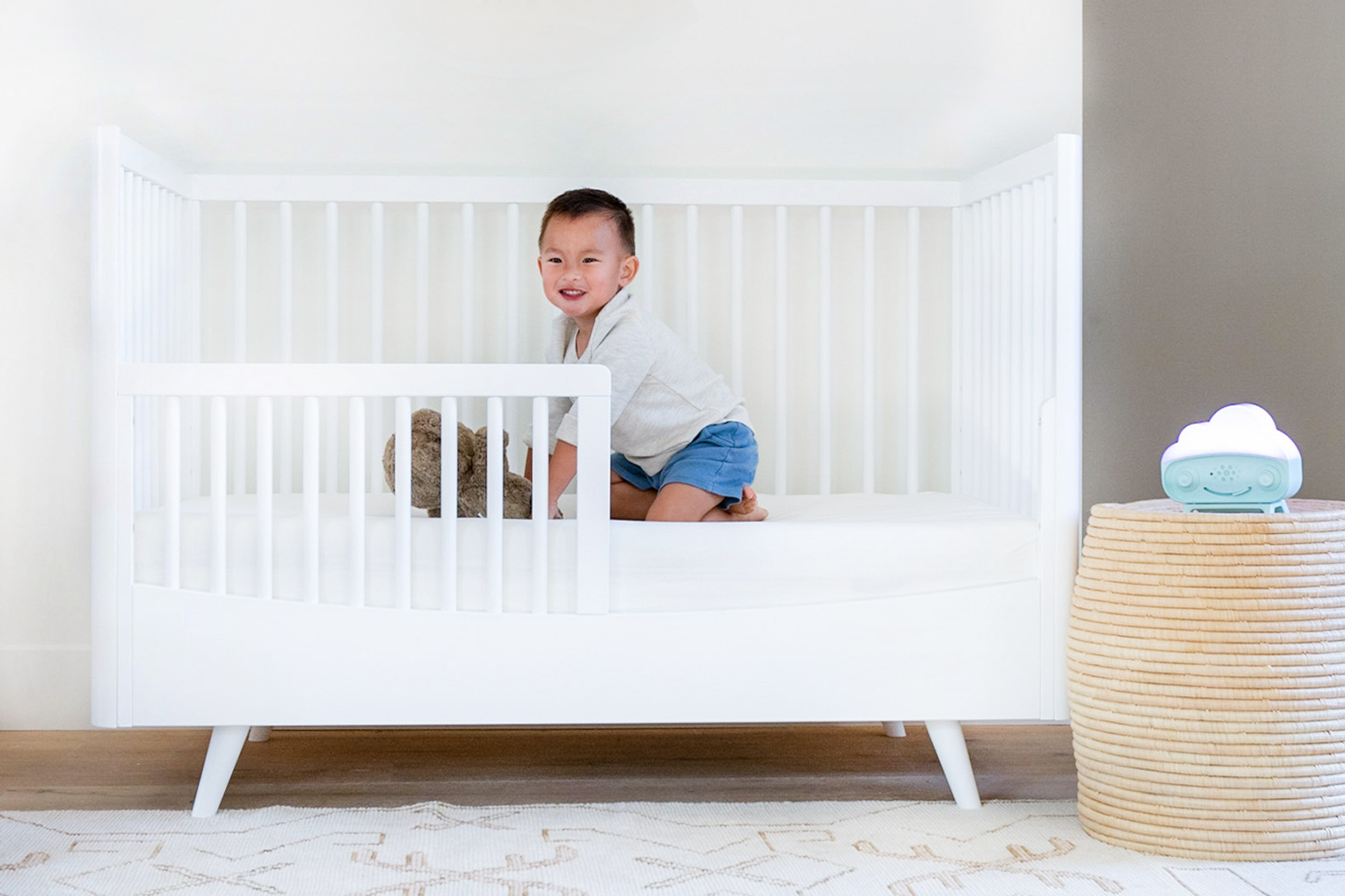 Toddler in bed using SNOObie, an OK-to-Wake clock