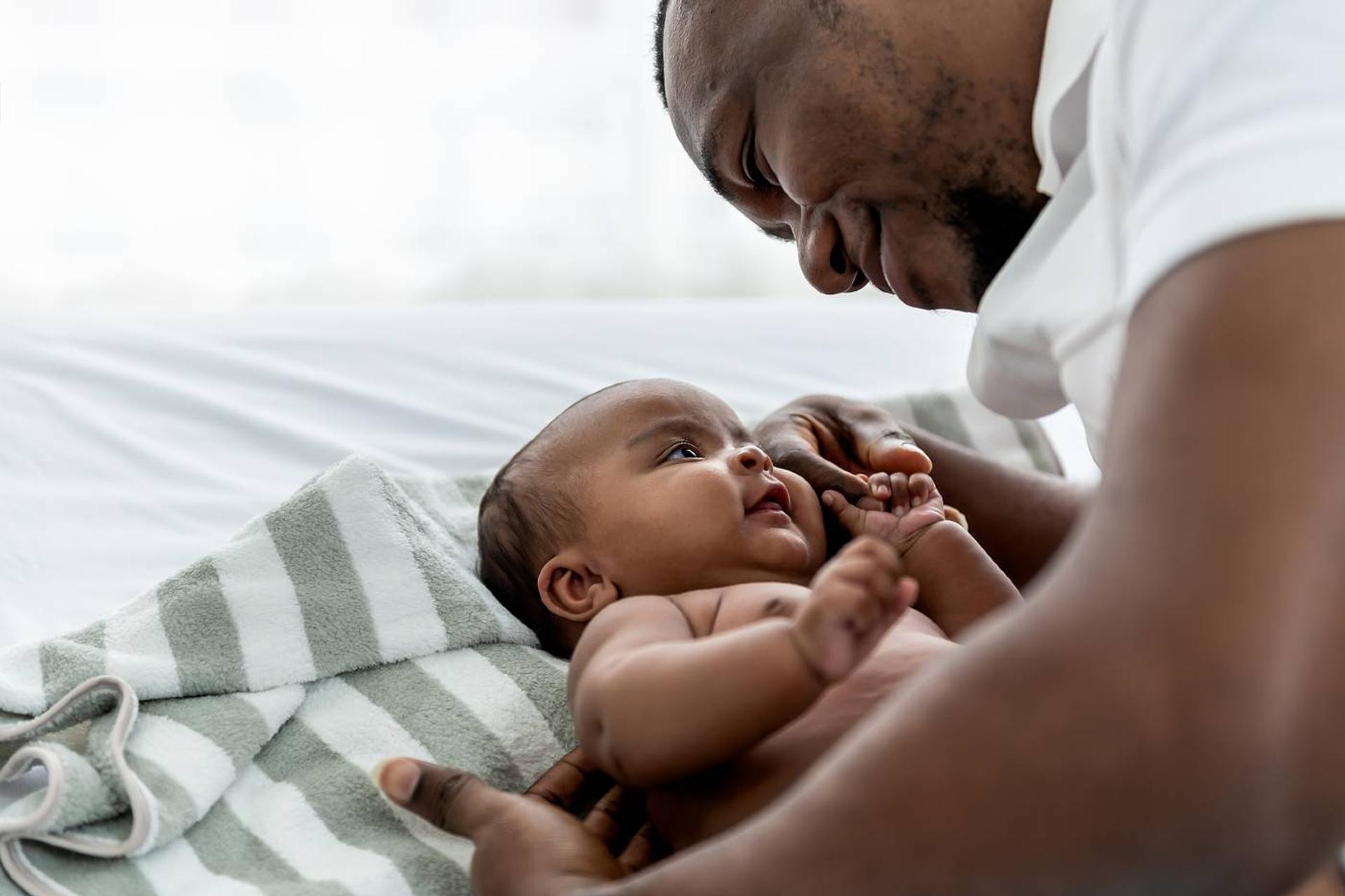 Baby and dad home on paternity leave