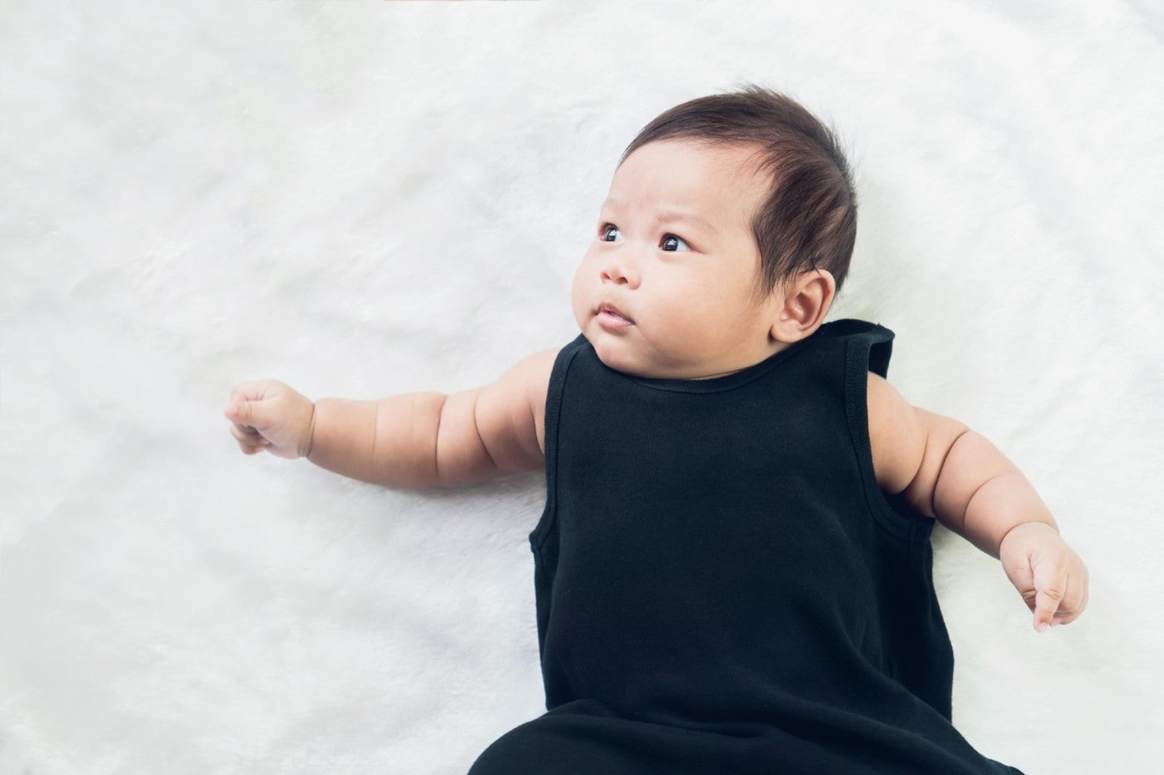 best baby names - cute baby laying down