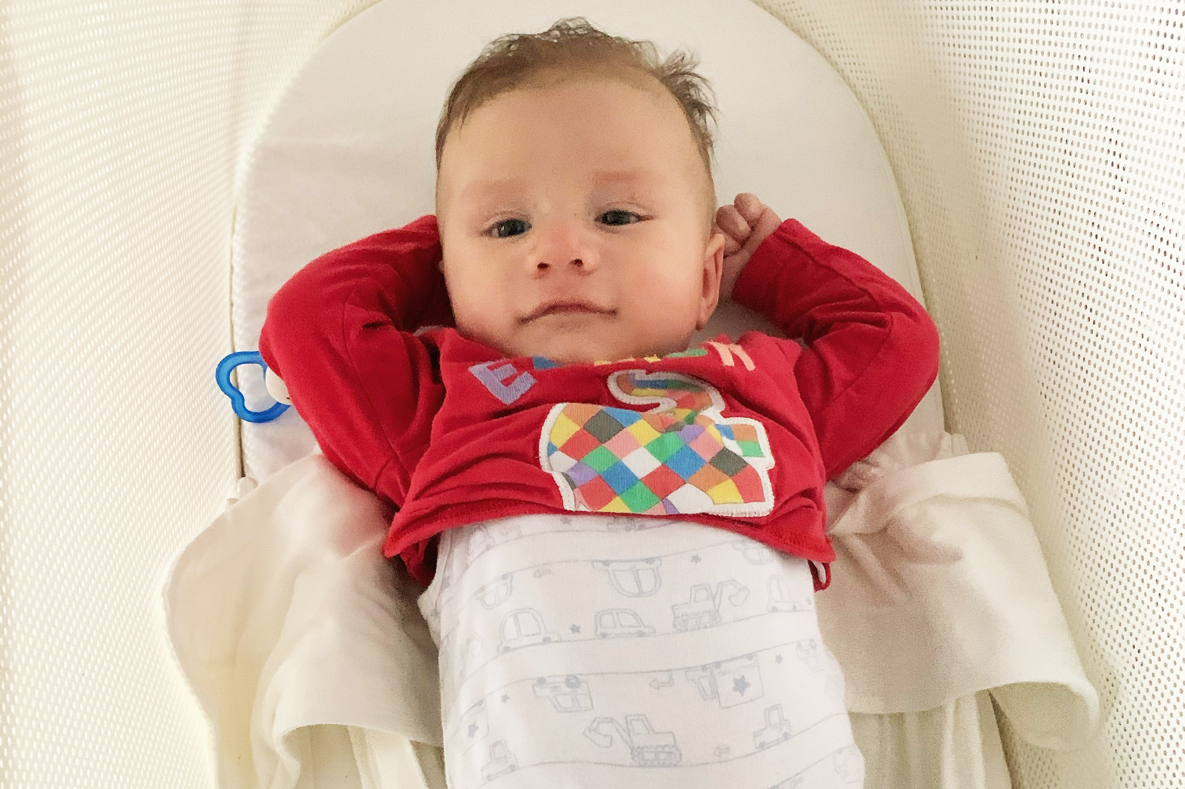 baby-stretching-in-snoo