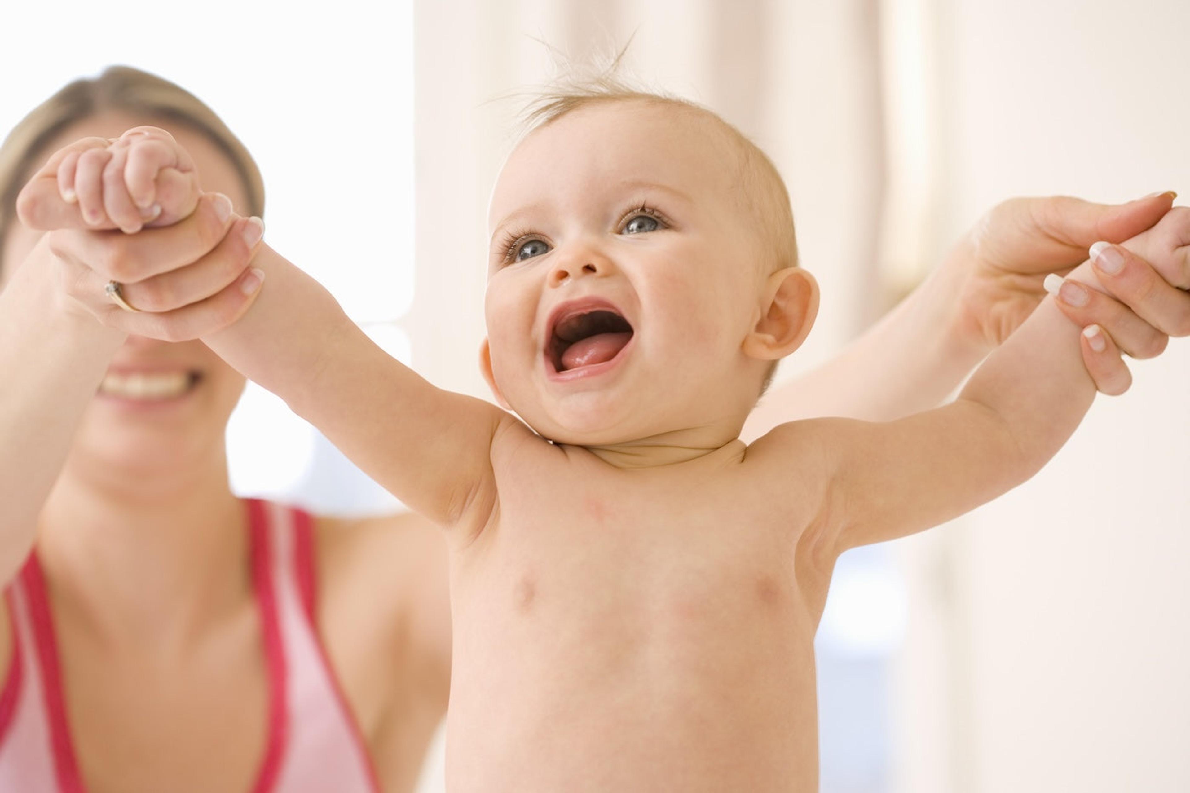 Baby with arms outstretched into a V-shape