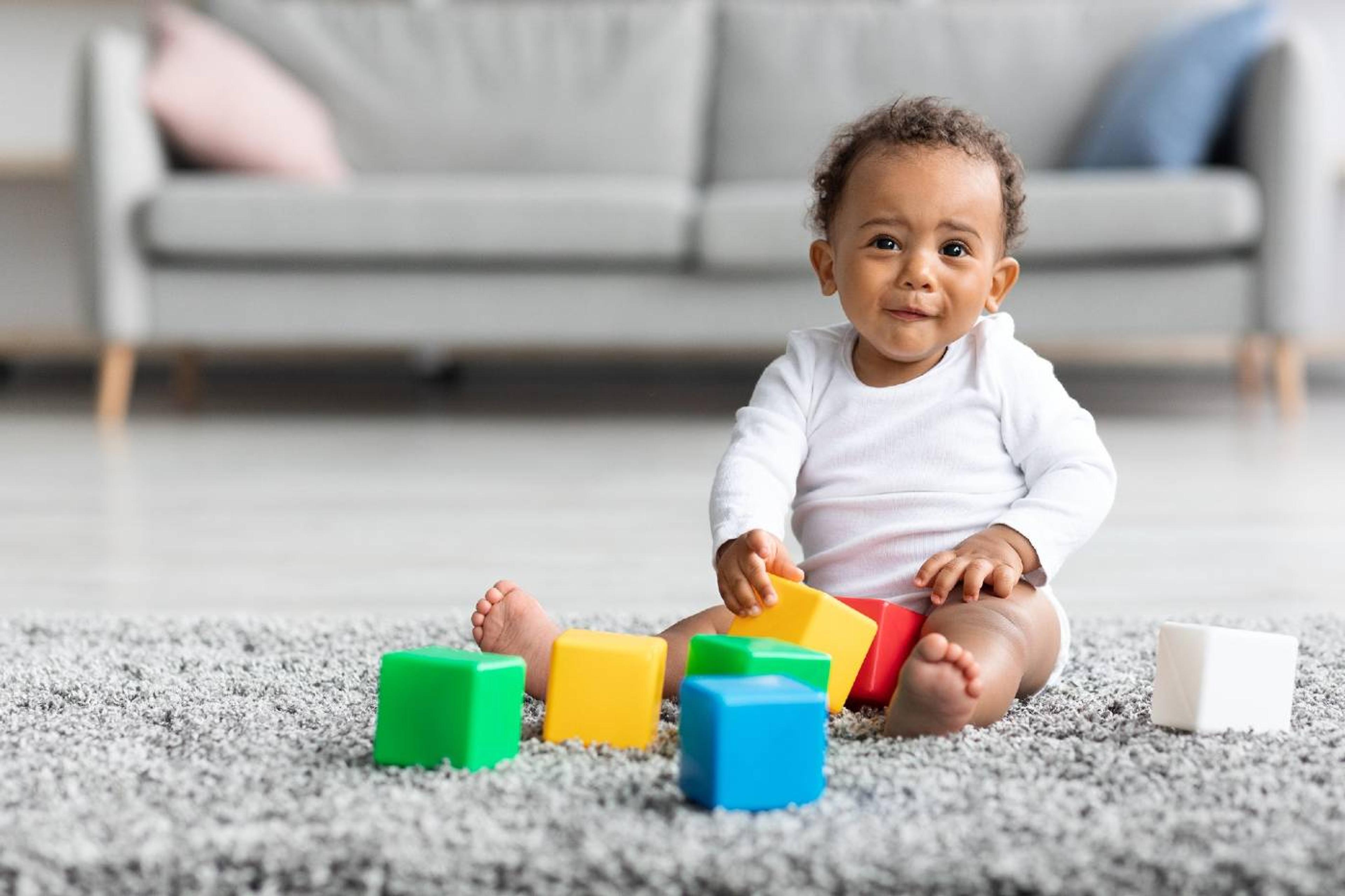 Toddler playing with blocks