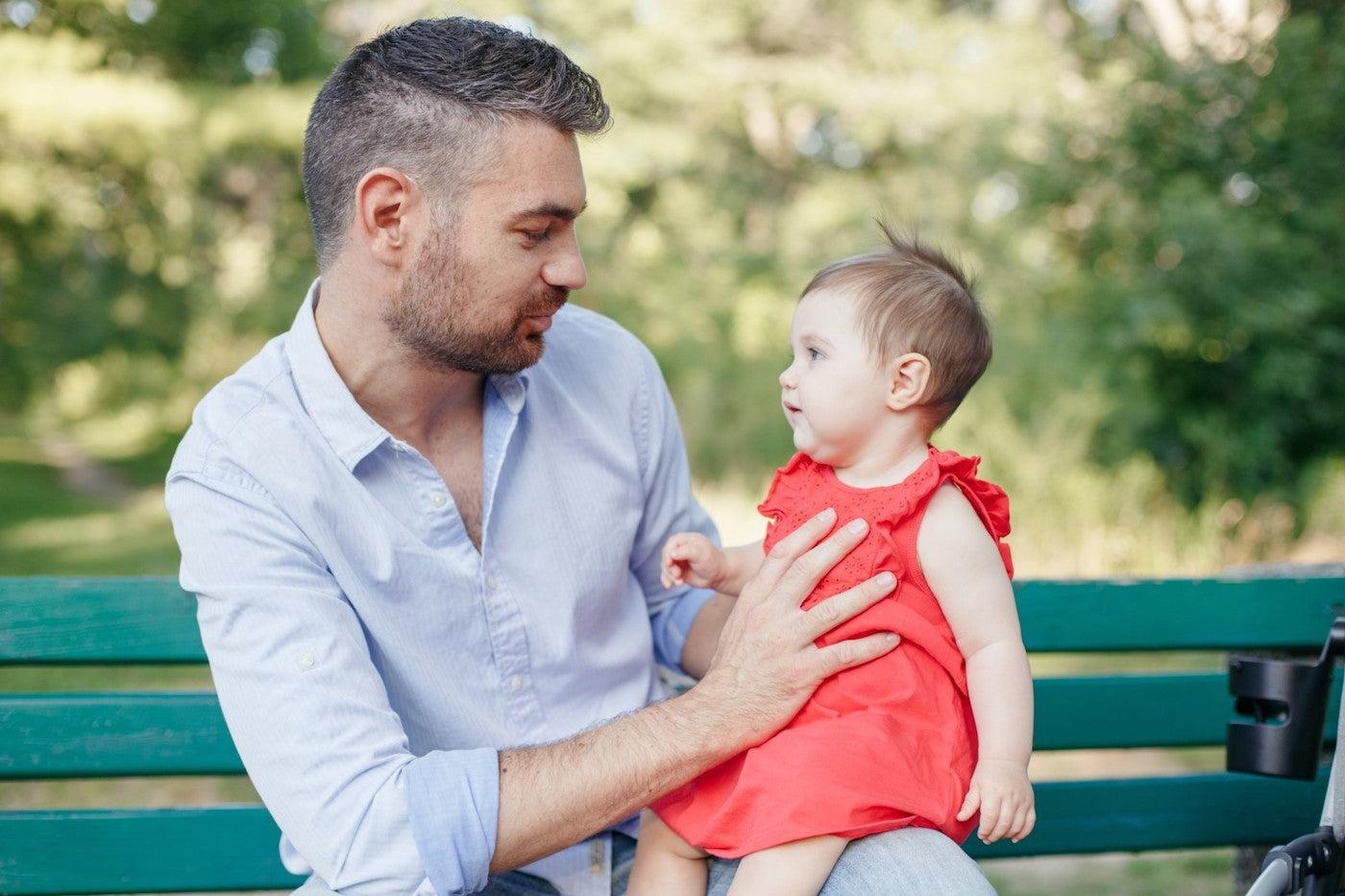 Dad with baby that's learning to talk