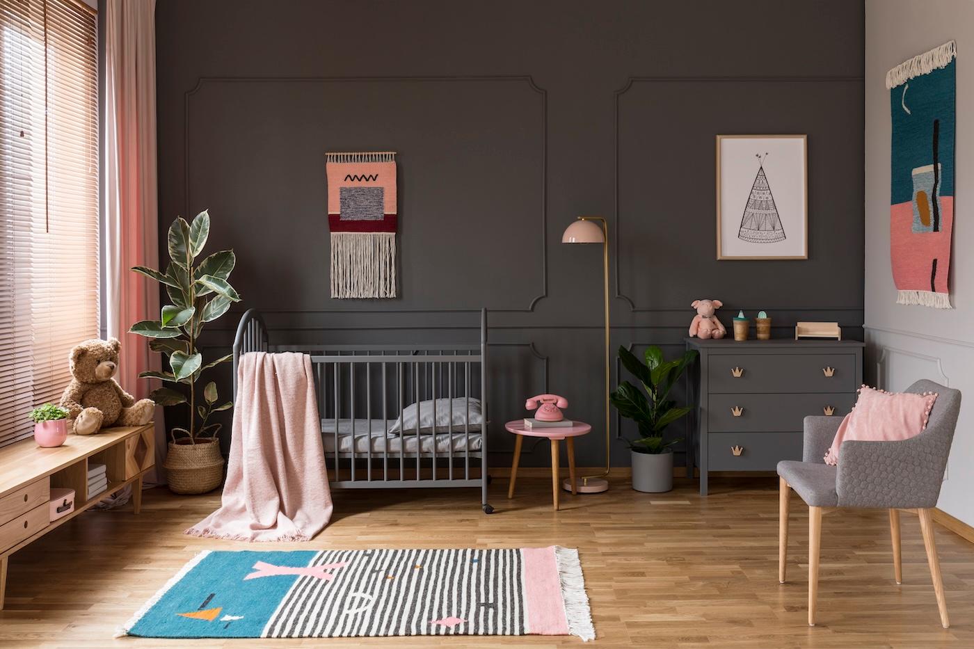 Modern gray and pink nursery for a baby girl