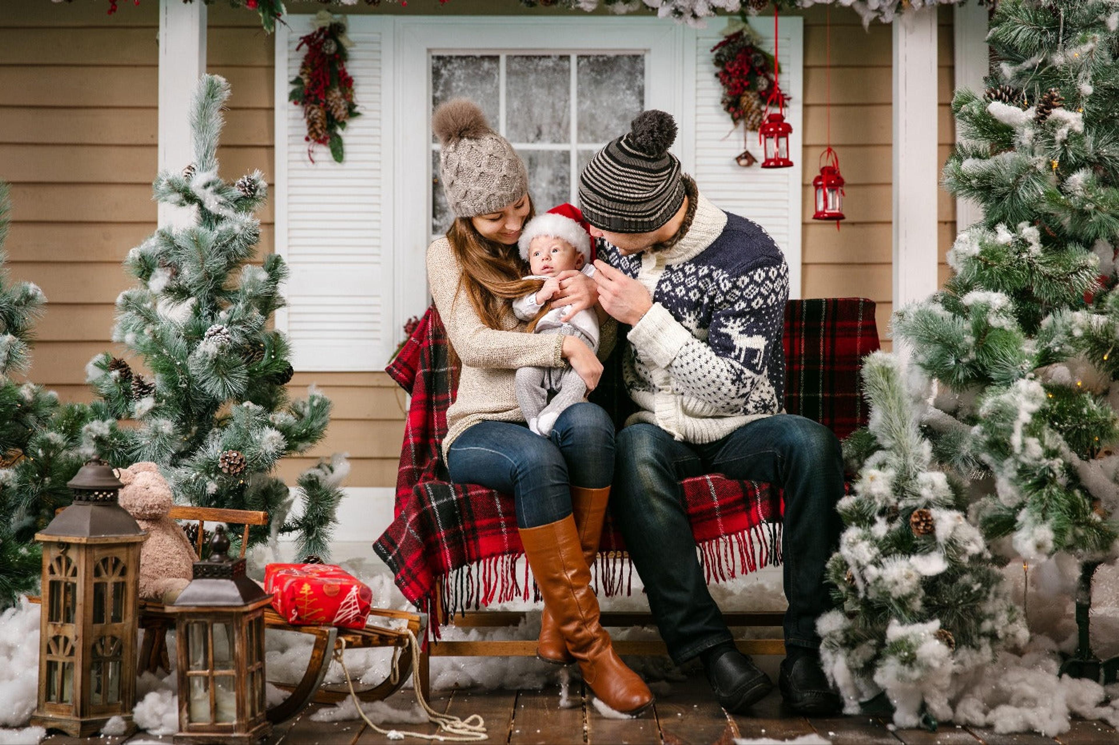 Young family celebrating first Christmas