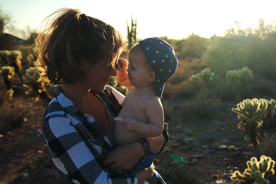Mom with toddler in her arms