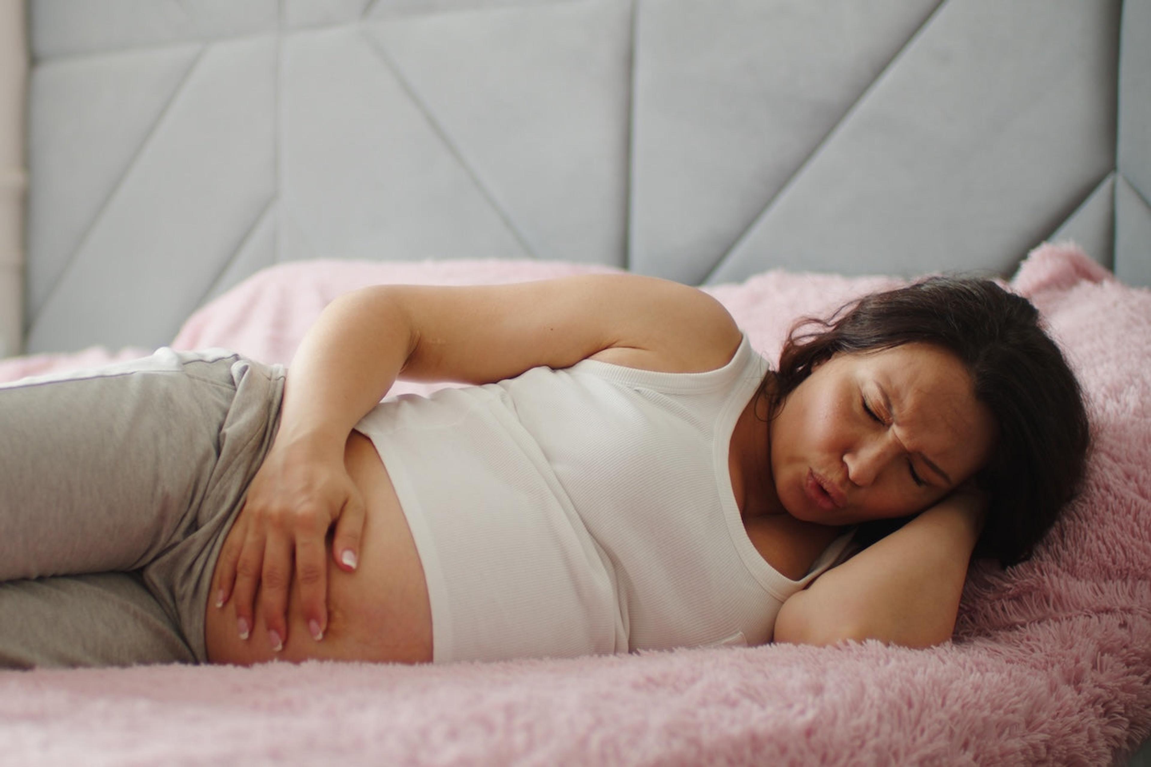 A pregnant woman experiences false labor pains in bed